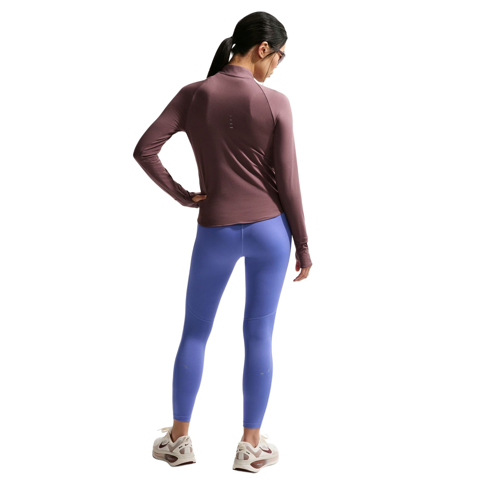 Nike Swift 1/4-zip running top Tattoo back full body view on model highlighting reflective details and curved hem design