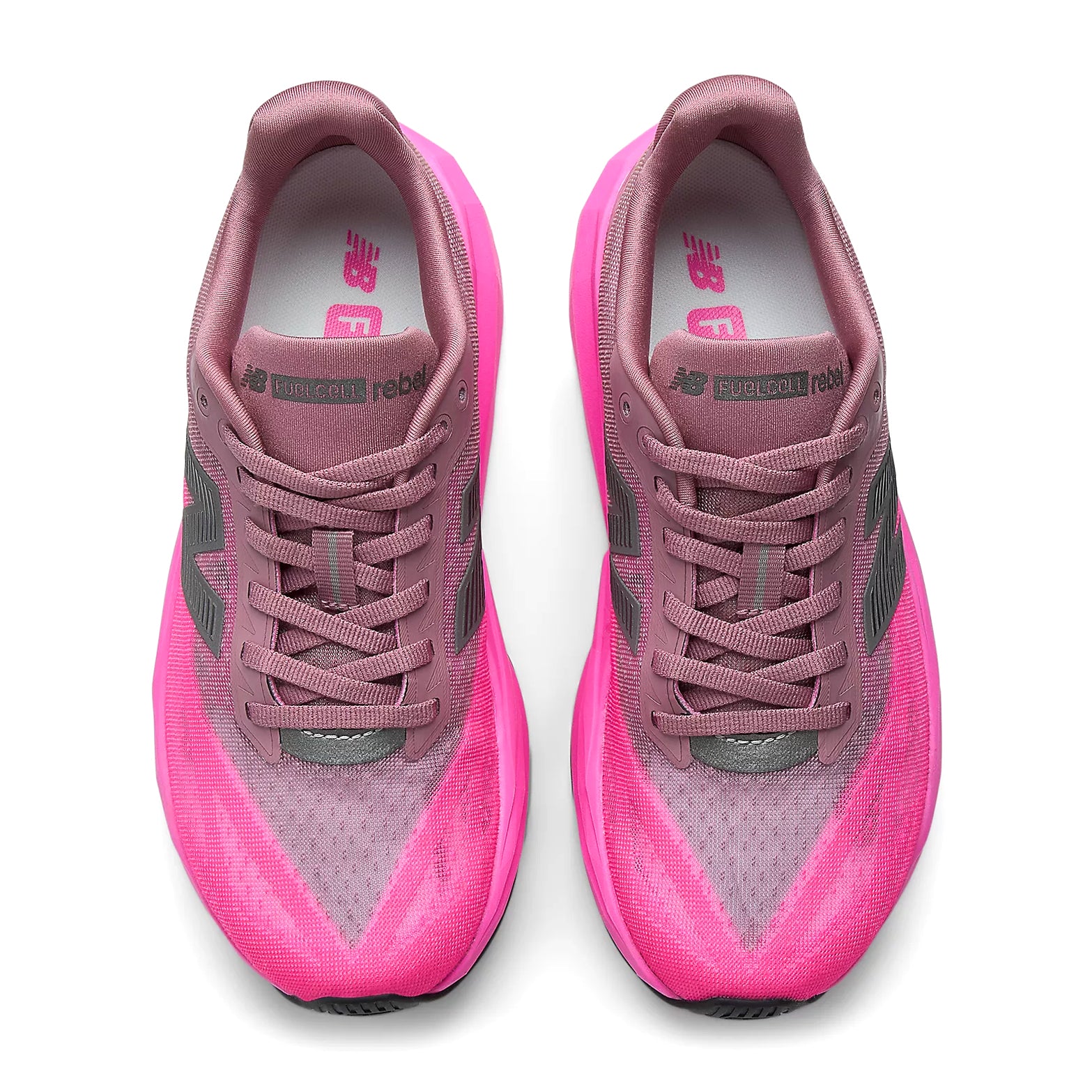 New Balance FuelCell Rebel v5 women's running shoe in Pink Heat / Rosewood — top-down view showing pink heat race-inspired mesh upper construction, redesigned tongue and lace closure with rosewood detailing
