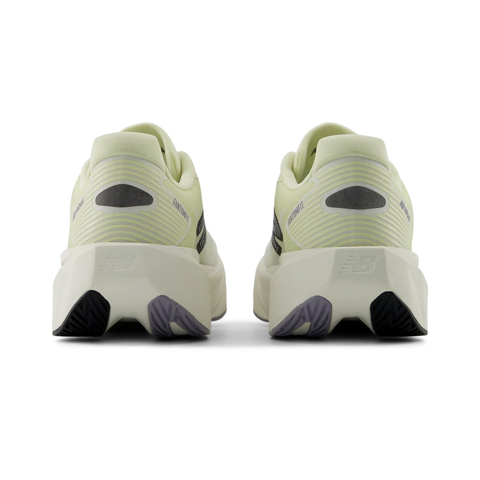 Women's New Balance FuelCell Rebel v5 Running Shoes Pistachio Butter Sea Salt heel view showing FuelCell foam blend with wider higher geometric midsole stack for increased cushioning and propulsive energy return