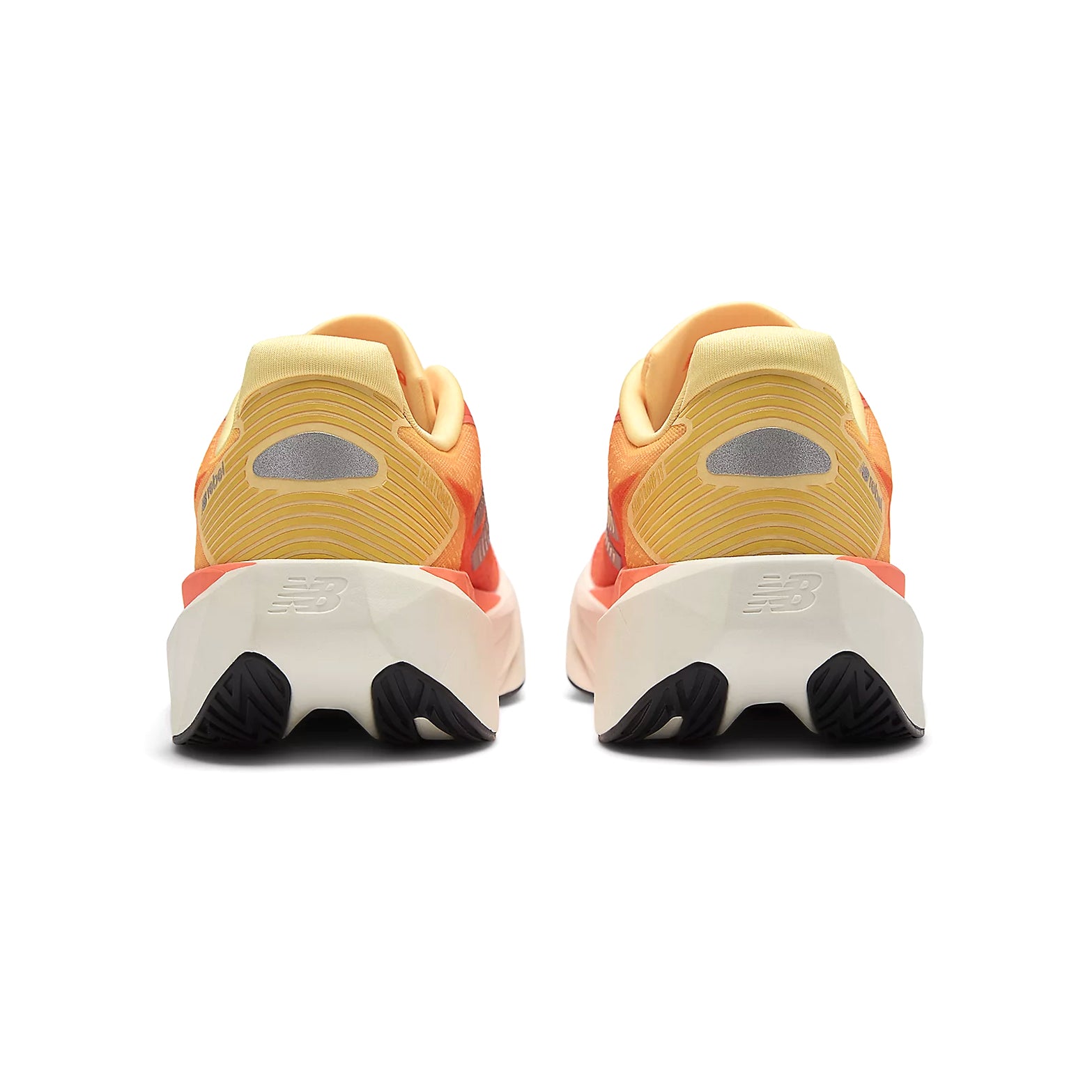 Women's New Balance FuelCell Rebel v5 Running Shoes Orange Grey heel view showing FuelCell midsole stack height, geometric design and redesigned heel construction