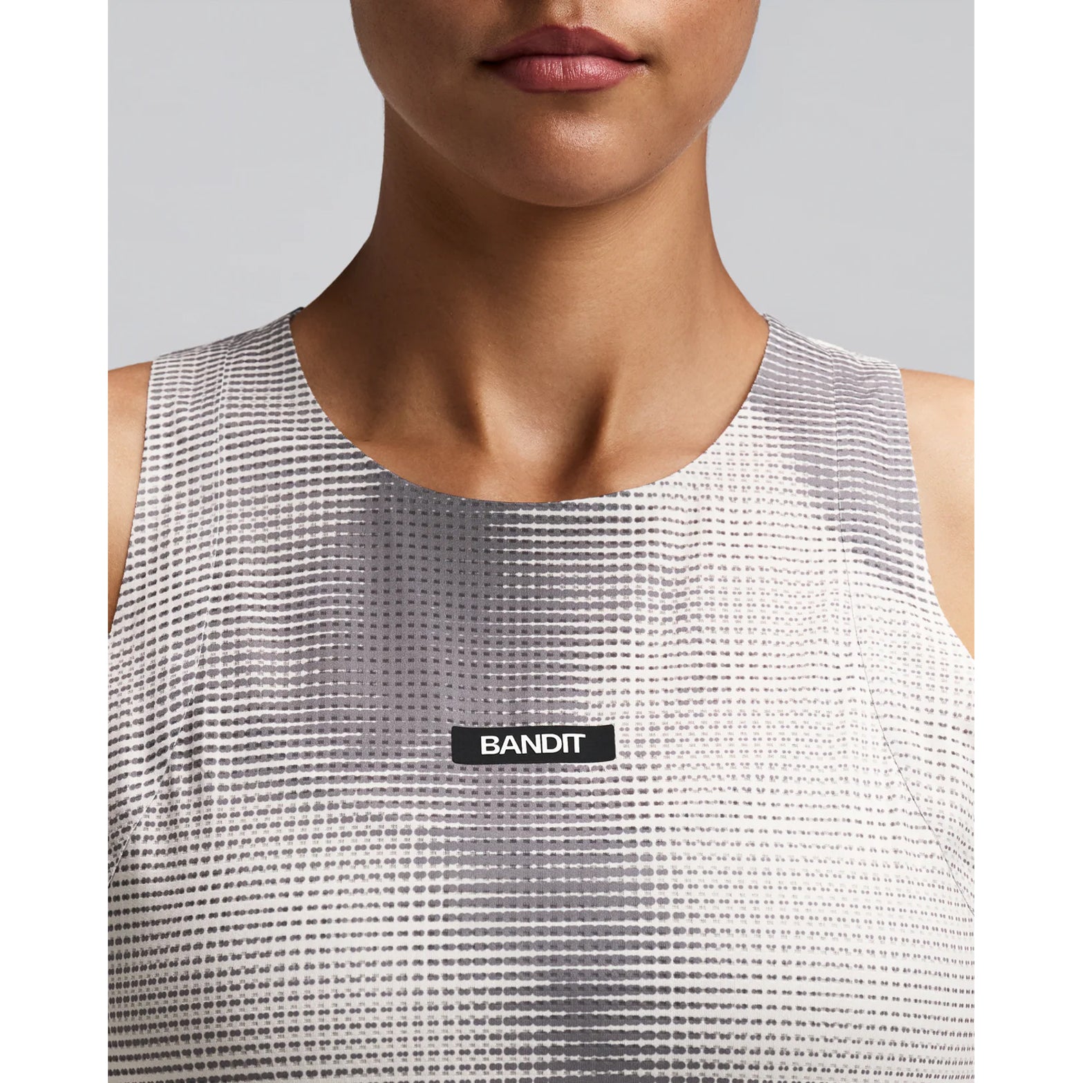 Women's Bandit GeoMesh Race Singlet Slate Plaster close-up of front showing GeoMesh performance knit with bonded neckline finishing and ultra-breathable four-way stretch construction