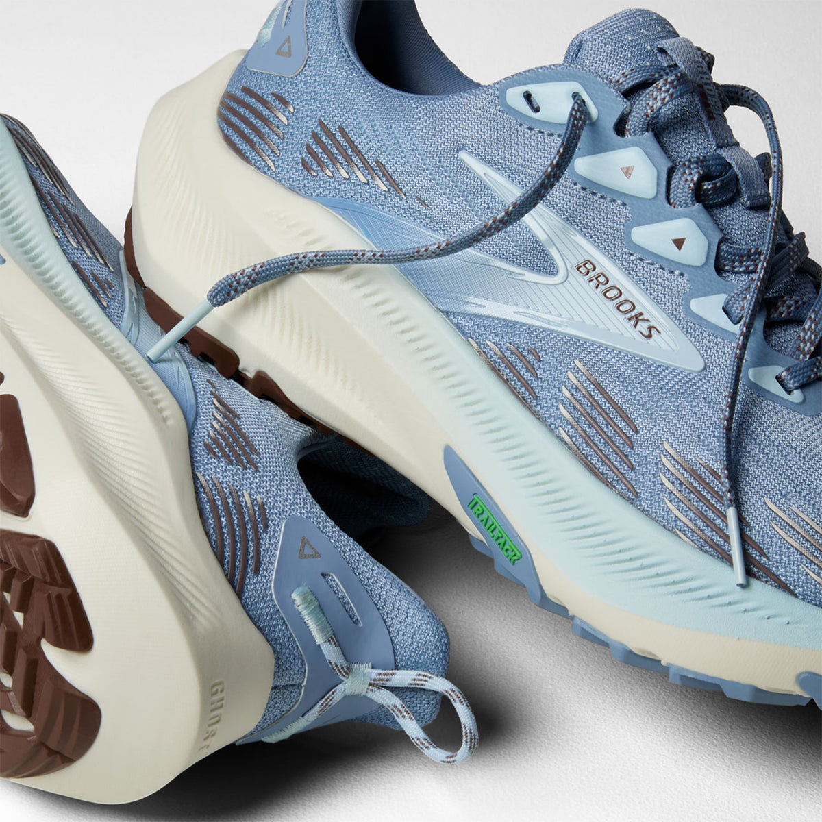 Women's Brooks Ghost Trail Running Shoes Blue Blue Brown angled side view of pair showing nitrogen-infused cushioning with TrailTack Green rubber outsole and 3D printed toe cap for versatile road to trail running
