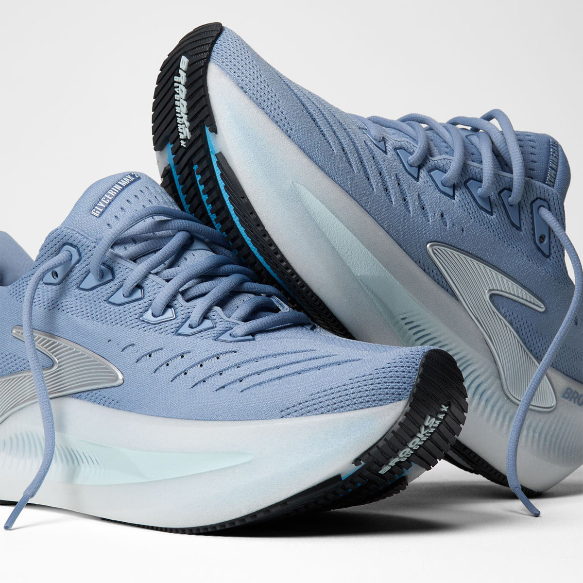 Brooks Glycerin Max 2 women's running shoe in Nantucket Breeze / Chrome / Blue — angled side view showing nantucket breeze engineered mesh upper, GlideRoll™ Rocker toe spring geometry and chrome nitrogen-infused DNA TUNED maximum stack height midsole