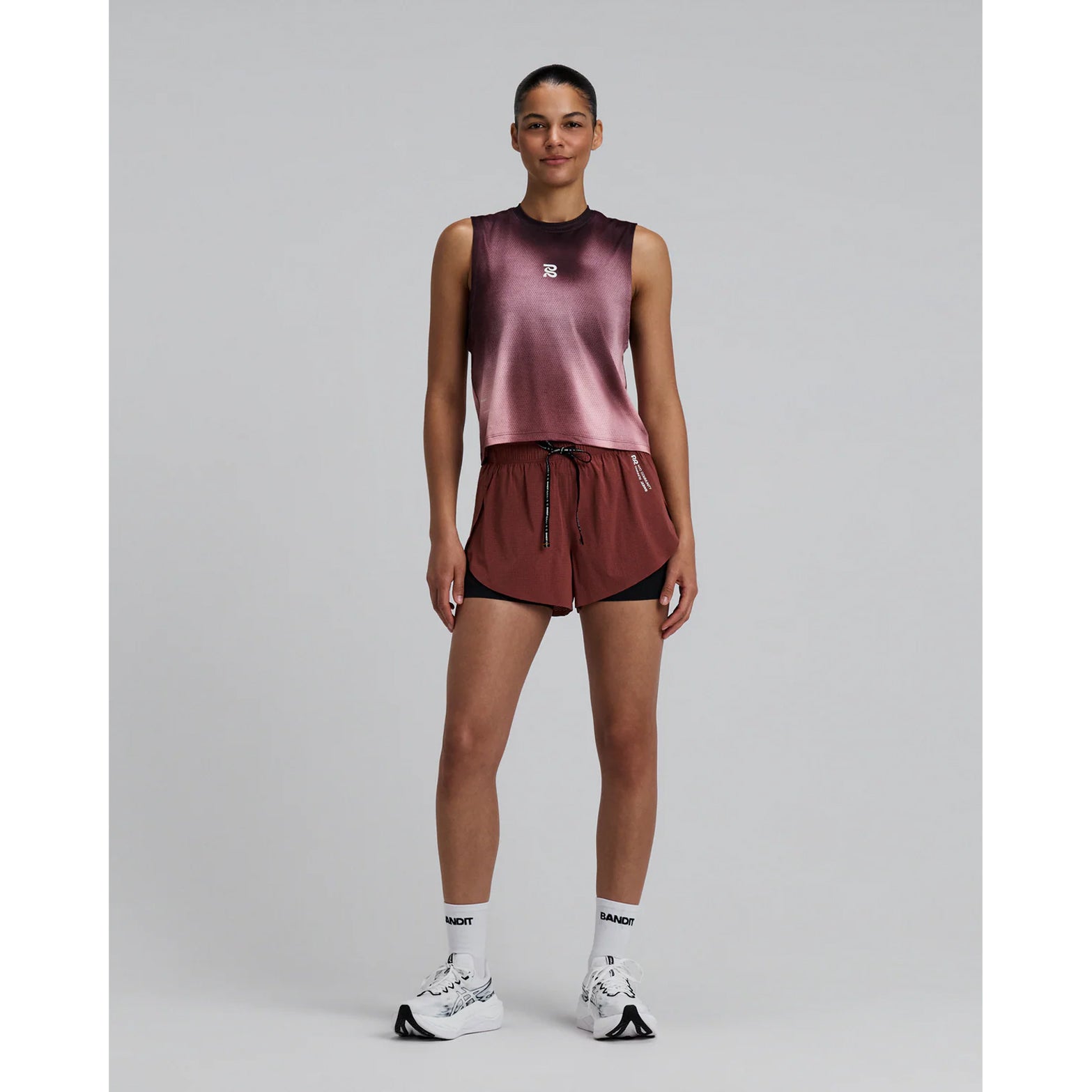 Women's Bandit Micromesh Run Tank Flow State Mahogany Multi full body front view on female runner showing sleeveless relaxed fit with moisture-wicking construction