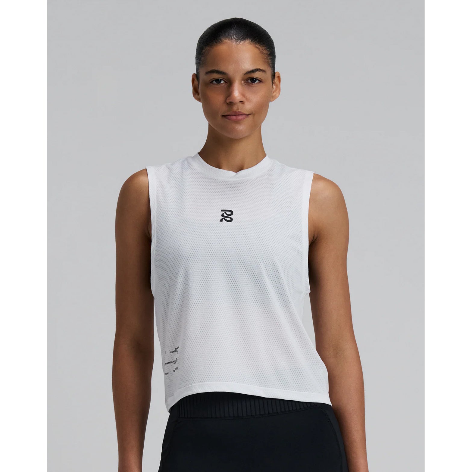 Bandit Micromesh Run Tank women's in White — front view worn on model showing relaxed sleeveless fit, crew neckline, Micromesh™ fabric drape and reflective logo detail at centre front
