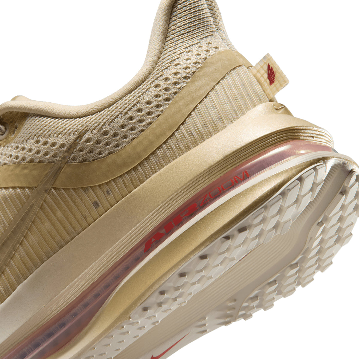 Women's Nike Pegasus Premium Running Shoes Light Khaki Metallic Gold Grain Sail Chalk angled side and heel view showing Air Zoom units surrounded by ZoomX foam for plush springy daily road running