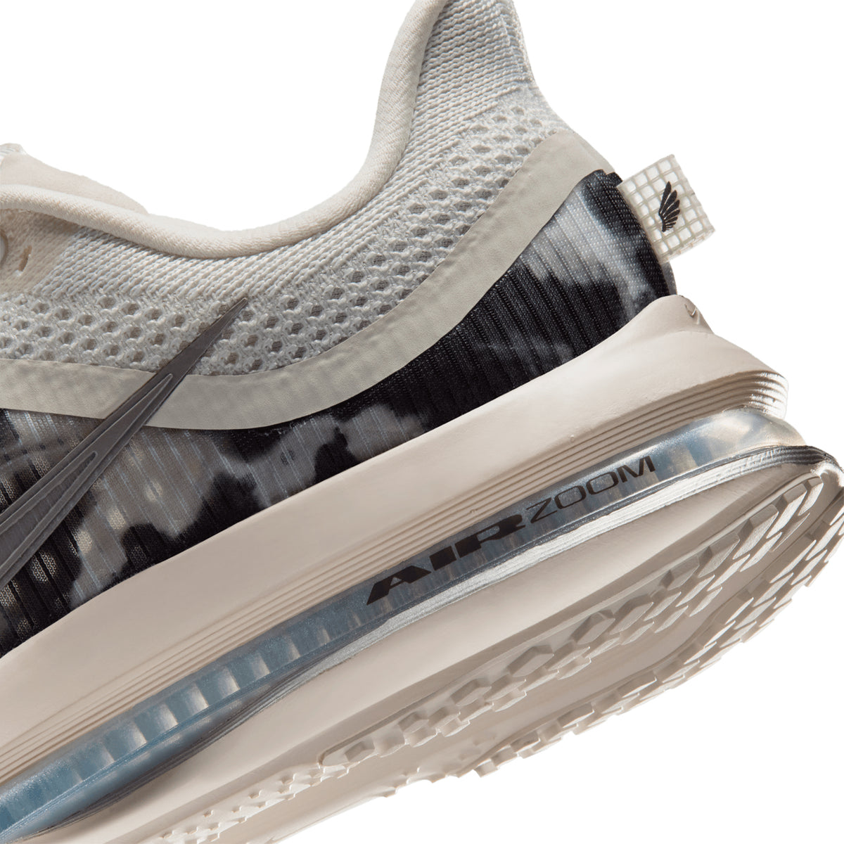 Nike Pegasus Premium SE women's running shoe in Phantom / Anthracite / Pencil Point — angled heel view showing circular knit heel construction, anthracite detailing and pencil point triple-stack midsole contrast