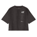 Women's On Performance Volt-T Iron product view showing relaxed fit with On DryTec quick-drying moisture-wicking fabric and expressive run-culture graphics