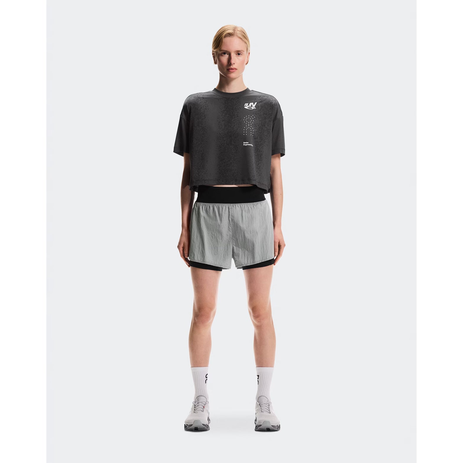 Women's On Performance Volt-T Iron full body front view on female runner showing relaxed fit with On DryTec moisture-wicking for running, training and post-workout wear