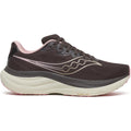 A Saucony Women’s Ride 19 Running Shoe in Torte/Eggshell, featuring a mesh upper with light pink accents, a thick cream-colored PWRRUN+ foam sole, and a wavy silver stripe design on the side. The shoe is displayed from the side against a white background.
