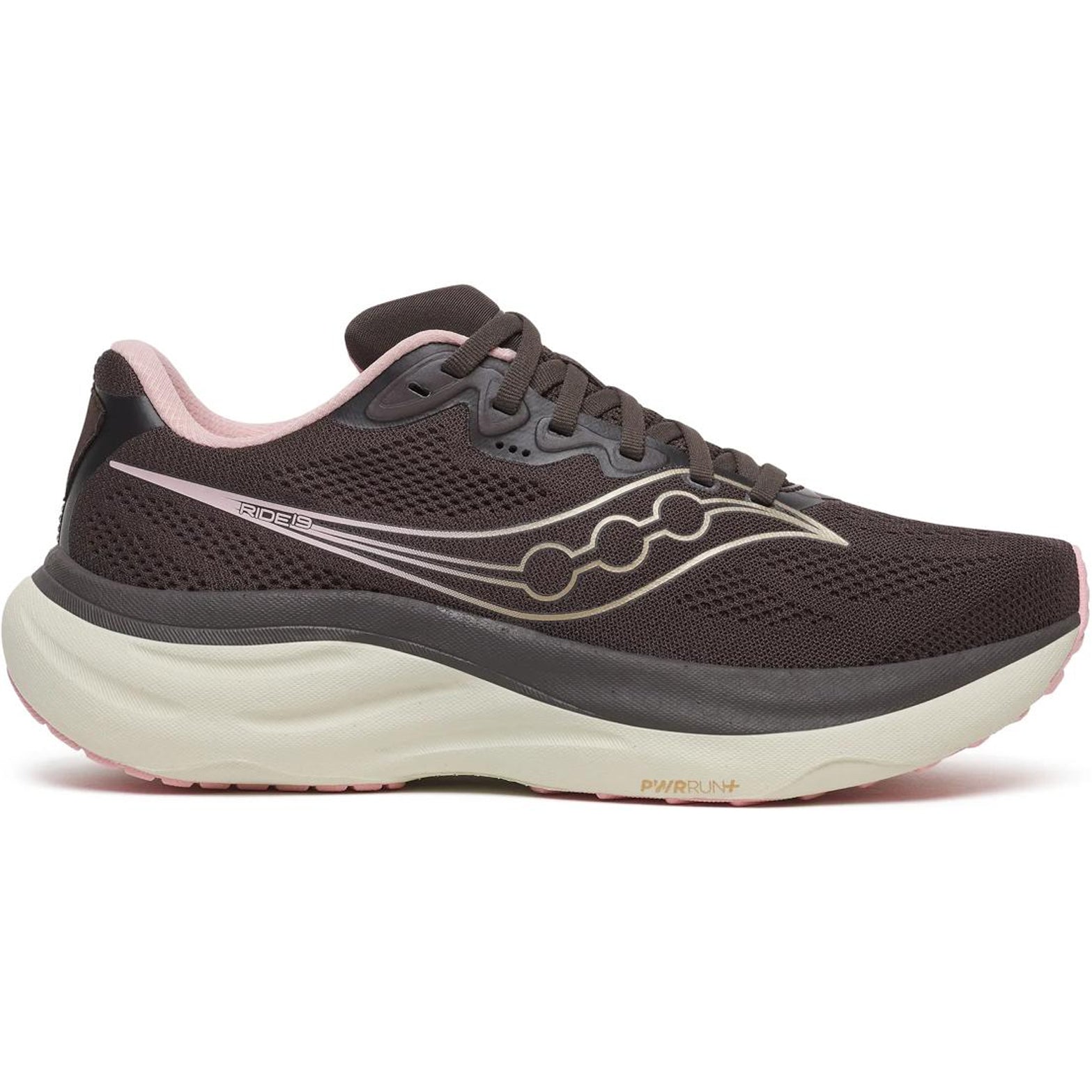 A Saucony Women’s Ride 19 Running Shoe in Torte/Eggshell, featuring a mesh upper with light pink accents, a thick cream-colored PWRRUN+ foam sole, and a wavy silver stripe design on the side. The shoe is displayed from the side against a white background.