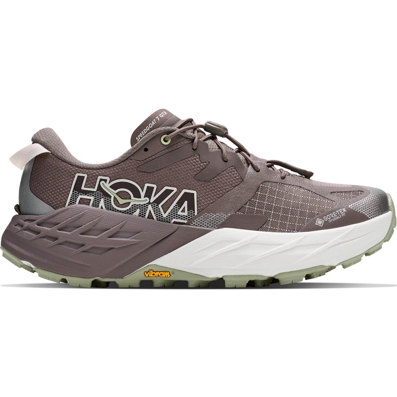 The Hoka Women’s Speedgoat 7 GORE-TEX Trail Running Shoes in Pebble Grey and Alabaster are shown from the side on a white background, featuring a brown and gray upper, white sole, Vibram outsole, and waterproof GORE-TEX labeling.