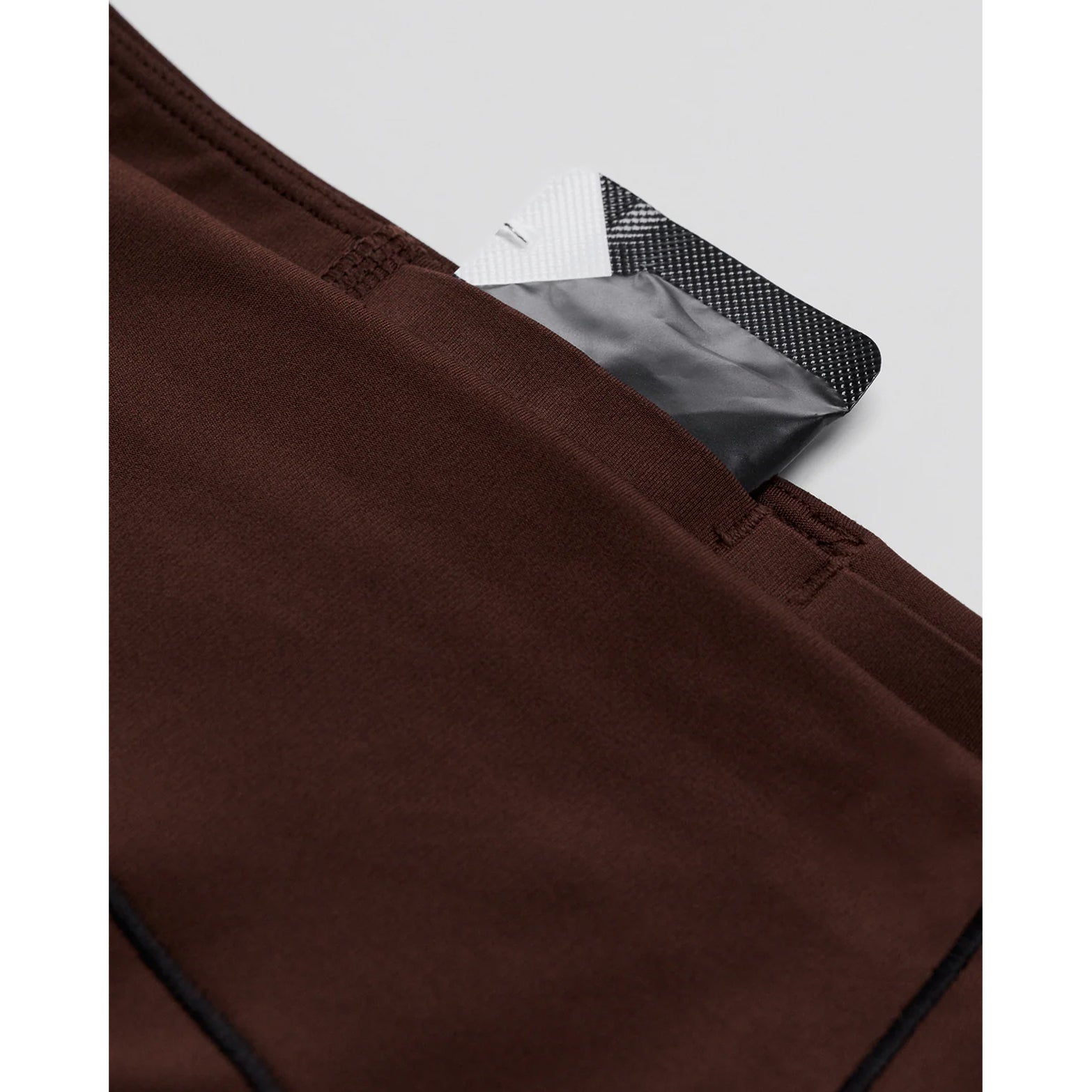 Women's Bandit Stamina-V High Waist Leggings close-up of waterproof phone pocket showing sweat-proof liner designed to disappear when running