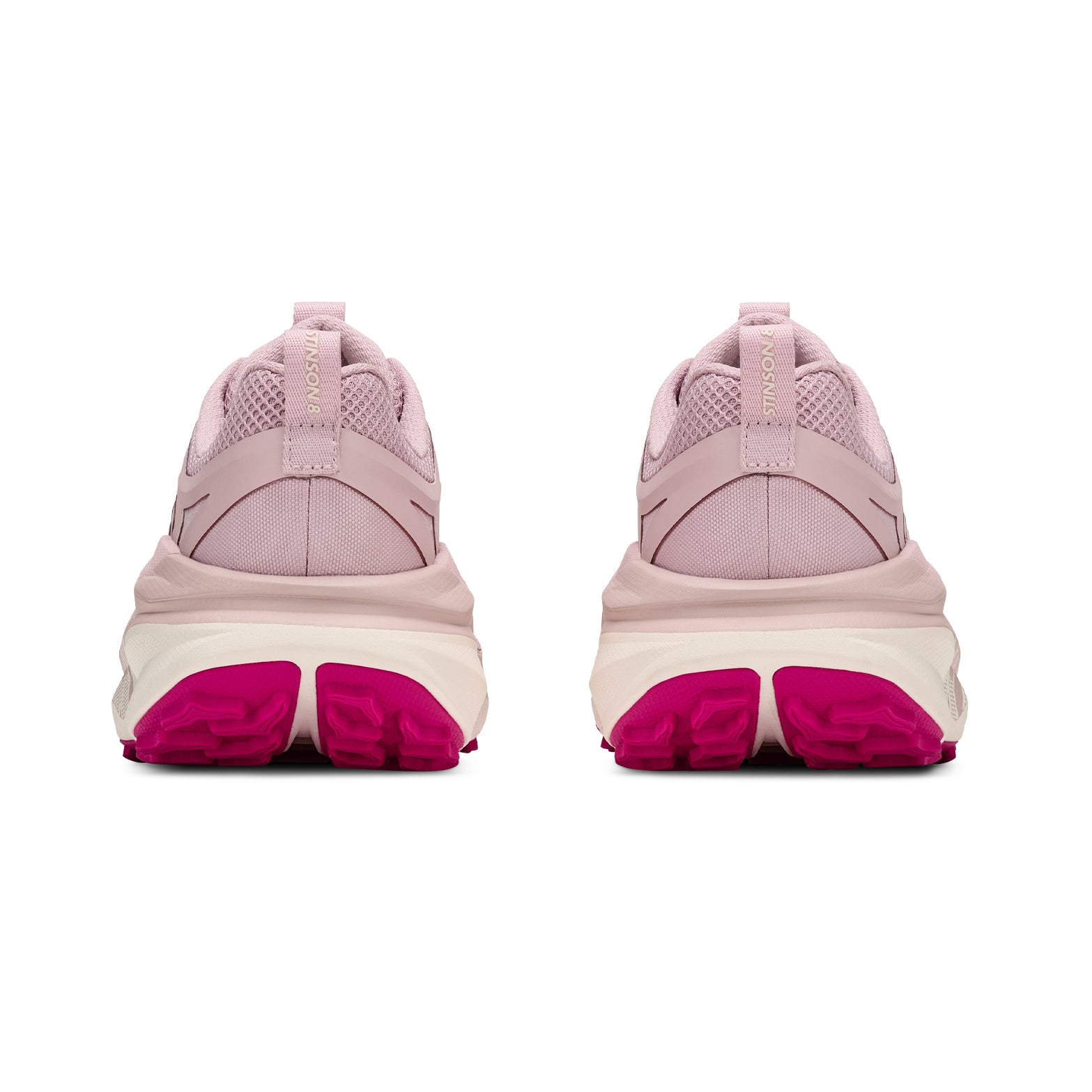 A pair of Hoka Women’s Stinson 8 Trail Running Shoes in Pink Opal / Alabaster are shown from the back, highlighting their white midsoles and vibrant pink outsoles against a plain white background. Designed for trail running, these sneakers feature H-Frame stability technology to provide dependable support across all terrains.
