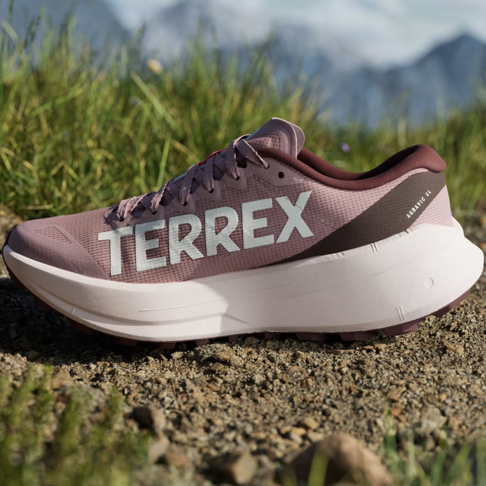 Women's adidas Terrex Agravic SL Trail Running Shoes Magic Mauve Cloud White Maroon inner side view showing LIGHTSTRIKE PRO cushioning with wider platform and elastic tongue wings for secure trail fit