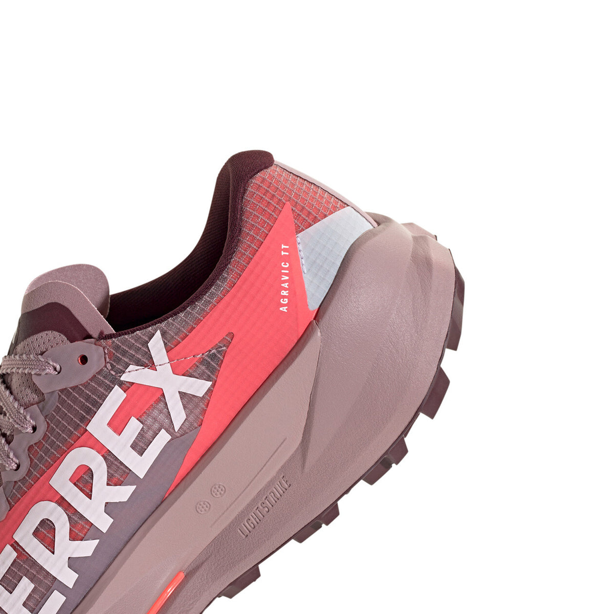 Women's adidas Terrex Agravic TT Trail Running Shoes Magic Mauve Cloud White Maroon angled side and heel view showing LIGHTSTRIKE PRO responsive cushioning with durable reinforced mesh and trail-gripping outsole for fast racing on technical rocky terrain