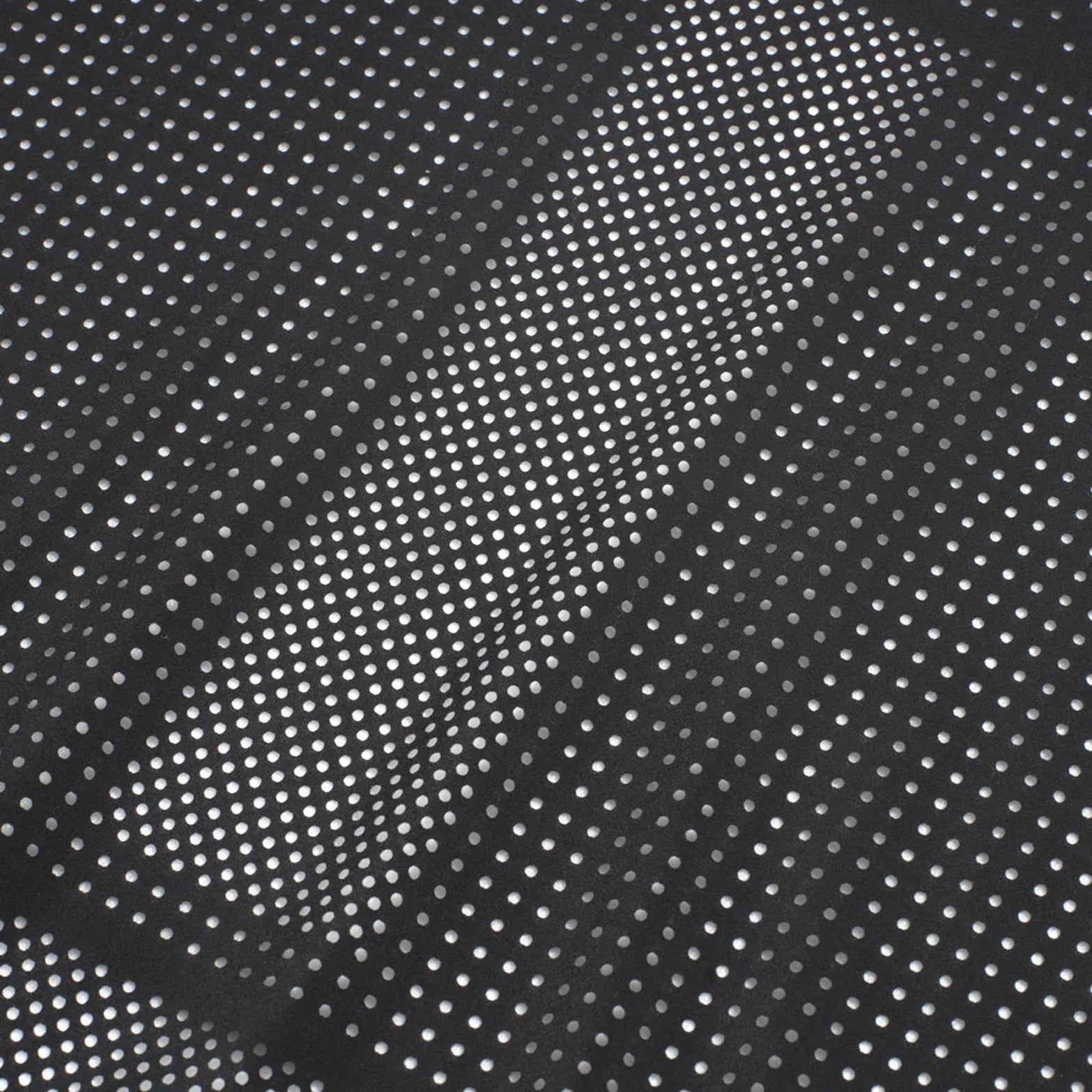 Women's Raide Thermal Dispersion Tee Black close-up of body-mapped laser-cut perforations showing concentrated centre back ventilation zones with 115gsm Italian-knit microfibre for maximum evaporative cooling