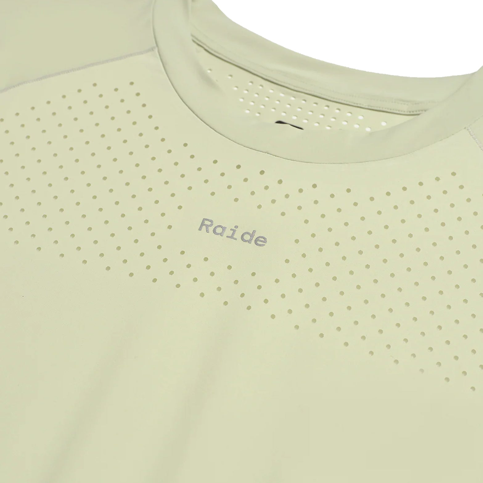 Women's Raide Thermal Dispersion Tee Lichen close-up of front showing reflective Raide branding with body-mapped laser-cut perforations and cool-to-touch 115gsm Italian-knit microfibre construction