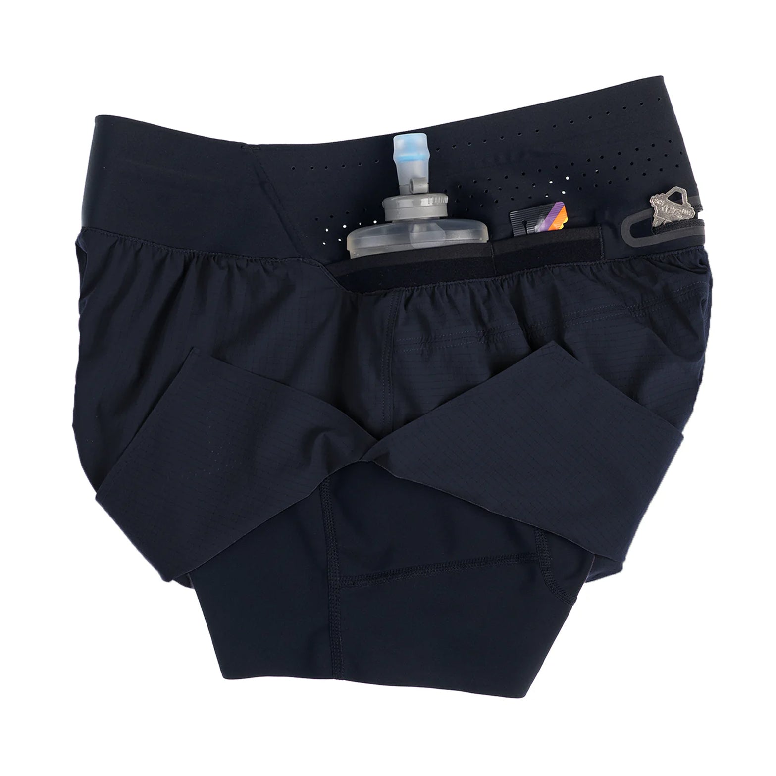 Raide TrailTech Short women's in Black — side view showing Italian-made liner construction, silicone grip at liner hem and recycled polyester elastane fabric detail