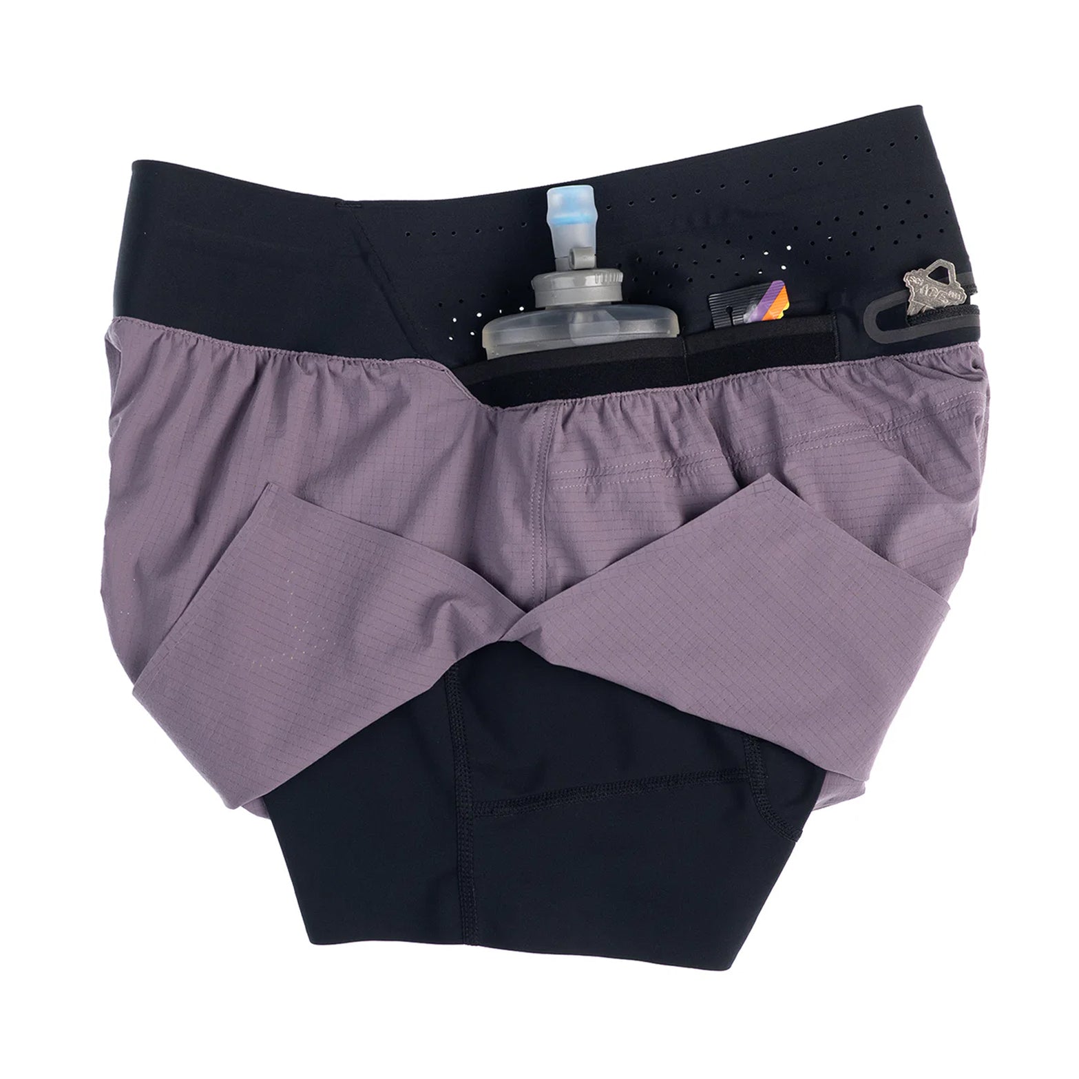 Raide TrailTech Short women's in Dusk — side view showing Italian-made liner construction, silicone grip at liner hem and recycled polyester elastane fabric detail