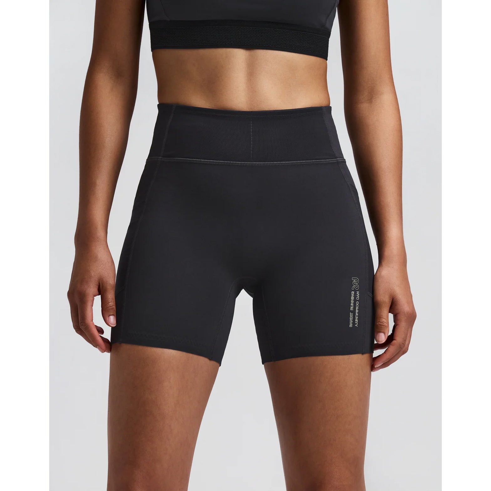 Women's Bandit Vanisher 5 Inch High Waist Compression Shorts Anthracite front view on female runner showing Vanisher sweat-hiding compression with Powermesh front pocket for gel storage