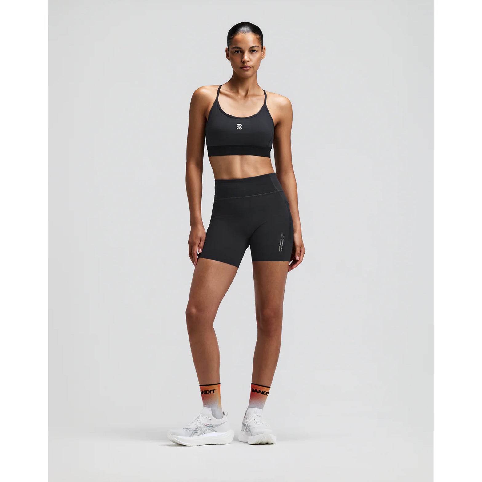 Women's Bandit Vanisher 5 Inch High Waist Compression Shorts Anthracite front full body view on female runner showing high waist Vanisher compression with seven-pocket system for road running and racing