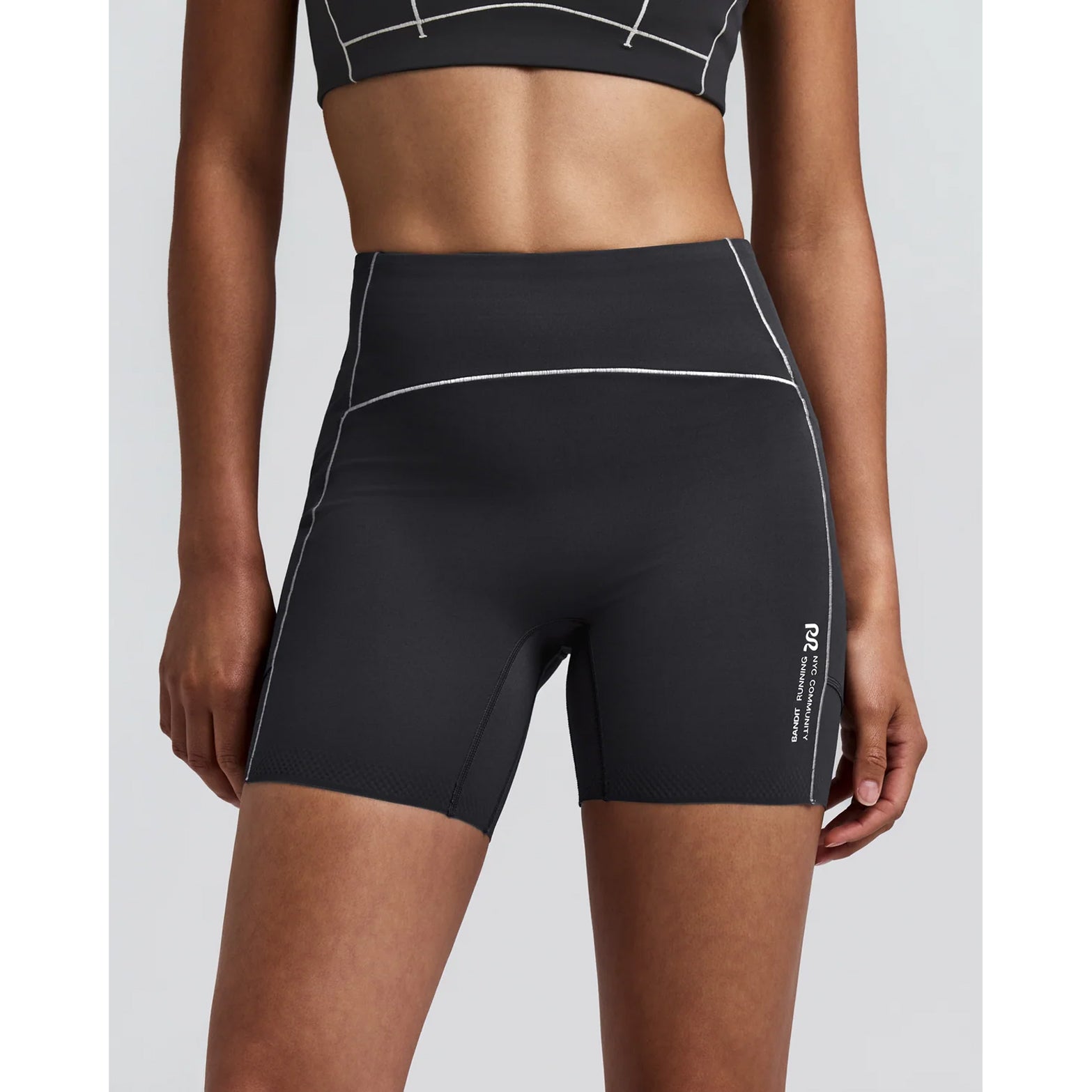 Women's Bandit Vanisher Pop Stitch 5 Inch High Waist Compression Shorts Anthracite front view on female runner showing Vanisher sweat-hiding compression with Pop Stitch detail and Powermesh front gel pockets