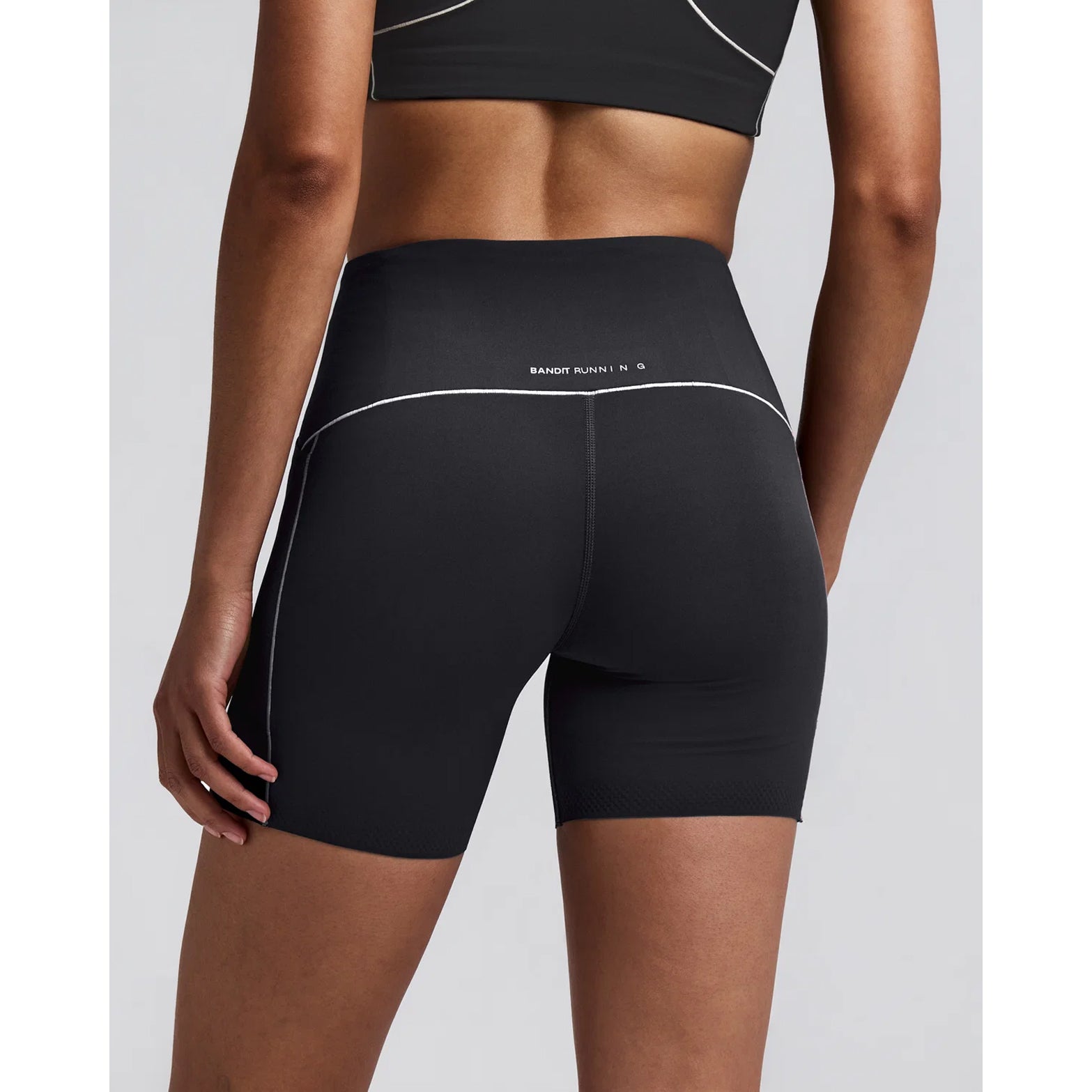 Women's Bandit Vanisher Pop Stitch 5 Inch High Waist Compression Shorts Anthracite close-up of back showing waterproof centre back phone pocket with Pop Stitch seam detail and GripDot hem construction