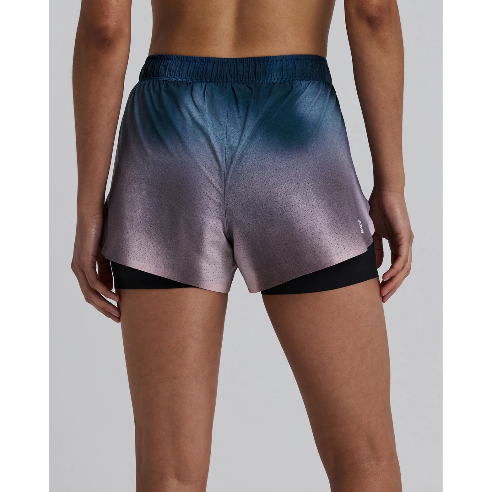 Bandit Vento™ 2-in-1 Run Short women's in Flow State Aegean Multi — back view worn on model showing Vento™ micro-perforated fabric construction, gel pocket placement and flow state aegean multi colourway