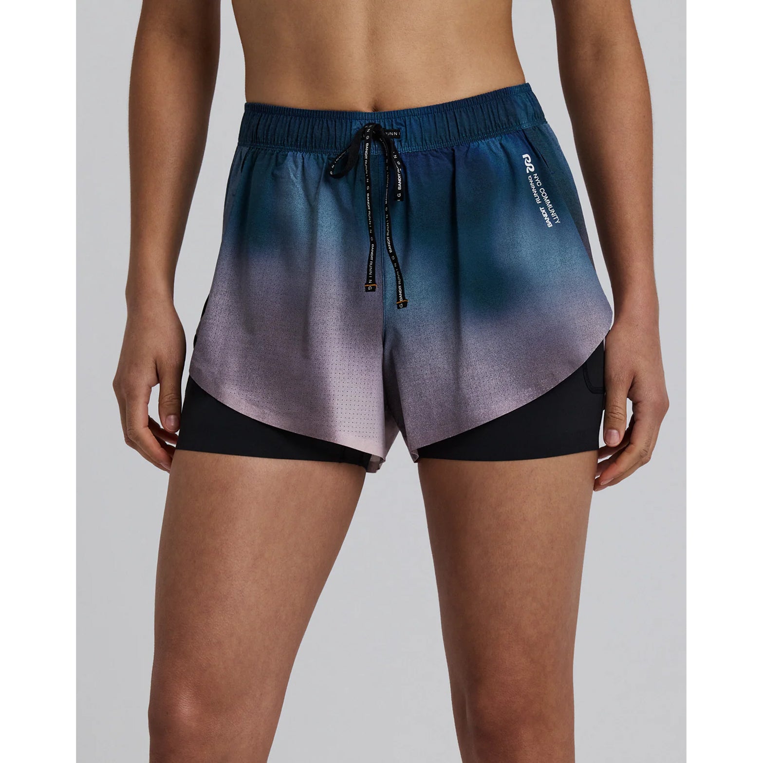 Bandit Vento™ 2-in-1 Run Short women's in Flow State Aegean Multi — front view worn on model showing 2-in-1 silhouette, flow state aegean multi Vento™ micro-perforated fabric and SoLite™ compression liner