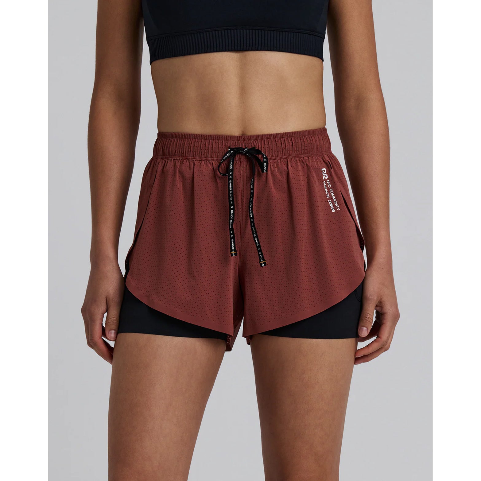 Women's Bandit Vento 2-in-1 Run Short Mahogany Black front view showing silky four-way stretch fabric with reflective branding and built-in compression liner
