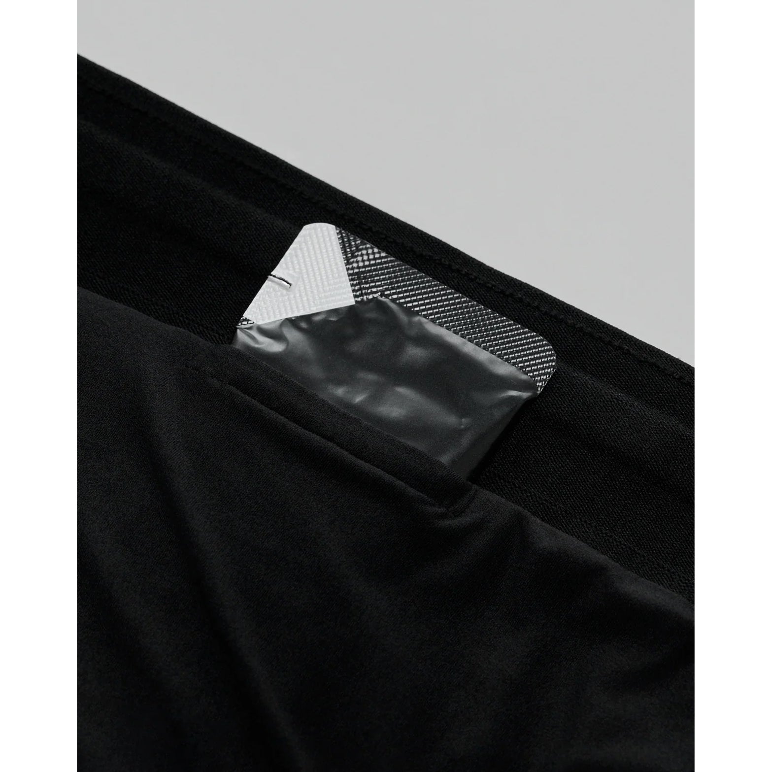 Bandit Vento™ Next Gen 3 Inch Split Shorts women's in Black — closeup showing four dedicated gel pockets within the bonded seamless waistband construction
