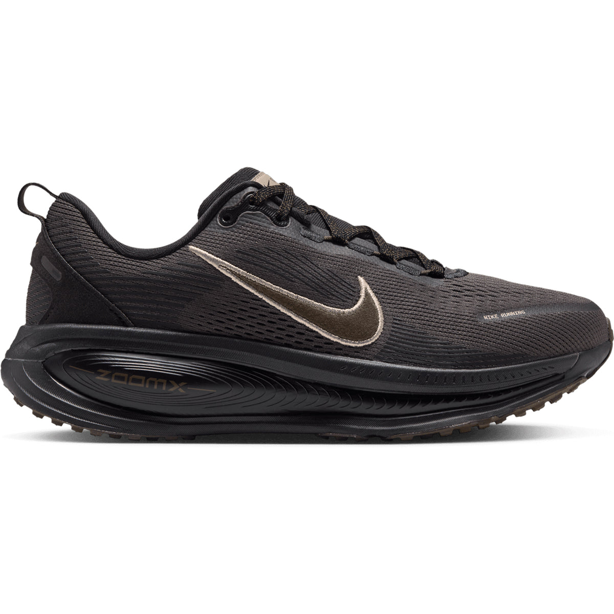 Women’s Vomero 18 Running Shoes in Medium Ash, Dark Hazel, Black, and Desert Khaki, featuring a metallic swoosh and a thick, ridged black midsole with dual-density cushioning.