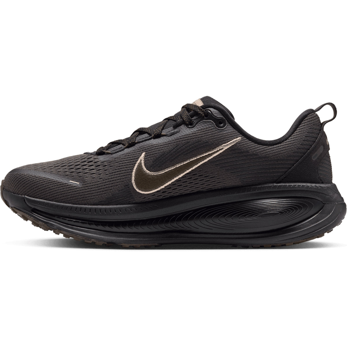 Women’s Vomero 18 Running Shoes in Medium Ash and Dark Hazel, featuring a bronze-colored swoosh logo and a black, dual-density cushioned sole.