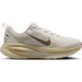 Women's Nike Vomero 18 Running Shoes Sail Metallic Gold Grain Light Khaki Filbert outer side view showing maximum cushioned midsole with breathable upper for plush daily road running