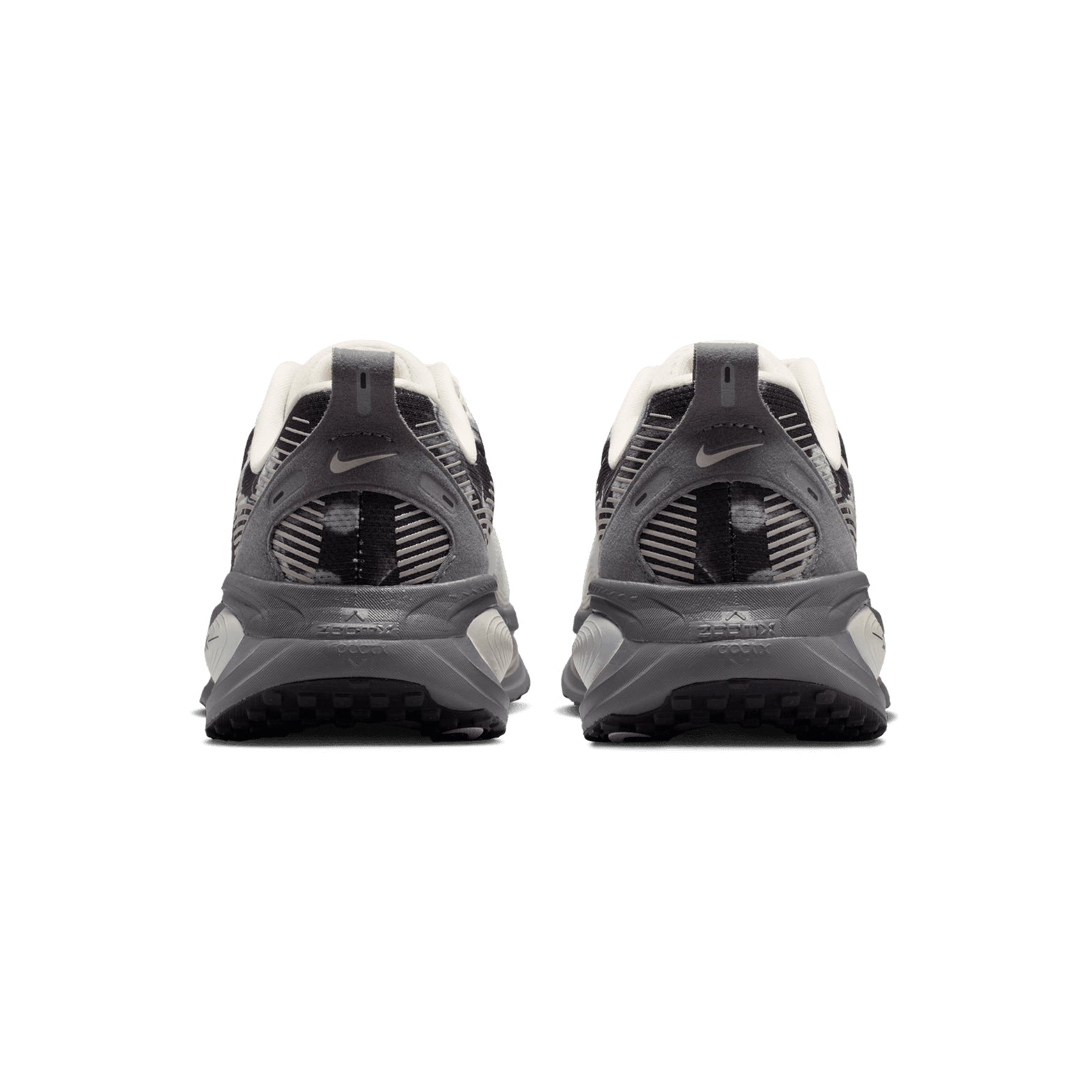 Nike Vomero 18 SE women's running shoe in Phantom / Sail / Pencil Point — heel view showing padded collar construction, sail heel detailing and dual-density ZoomX ReactX midsole contrast