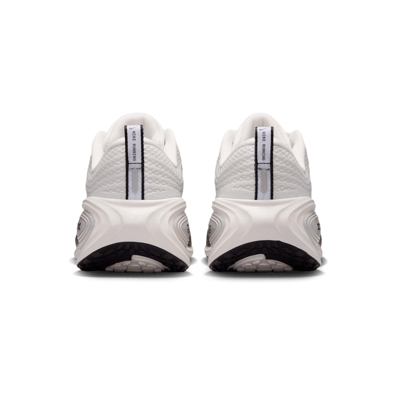Women's Nike Vomero Plus ESS Running Shoes Summit White Sail Anthracite Metallic Silver heel view showing maximal ZoomX foam stack with 10mm drop and high-abrasion rubber for plush protected daily running