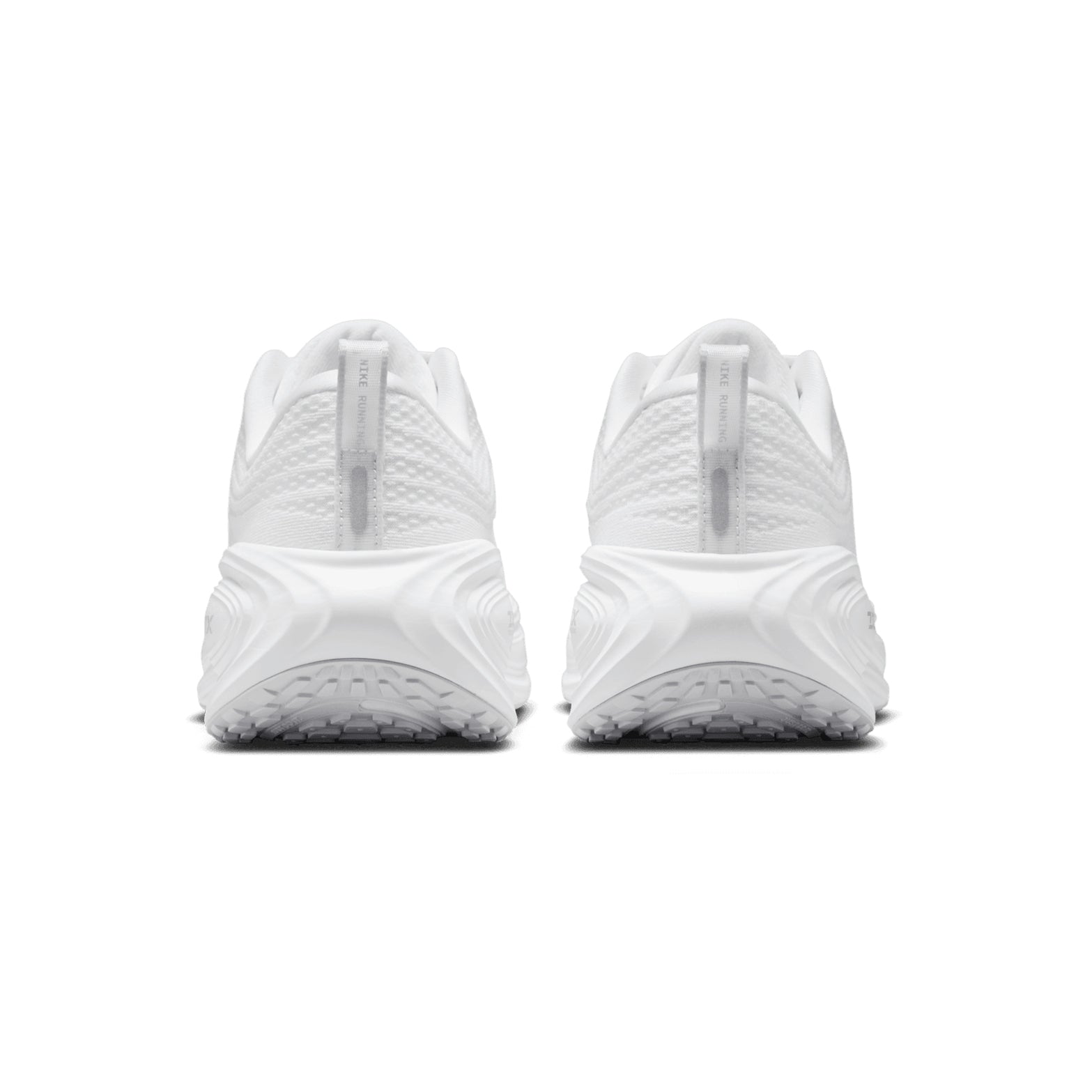 Nike Vomero Plus women's running shoe in White / Photon Dust / Metallic Silver / Summit White — heel view showing structured support construction, metallic silver heel detailing and photon dust cushioning midsole contrast
