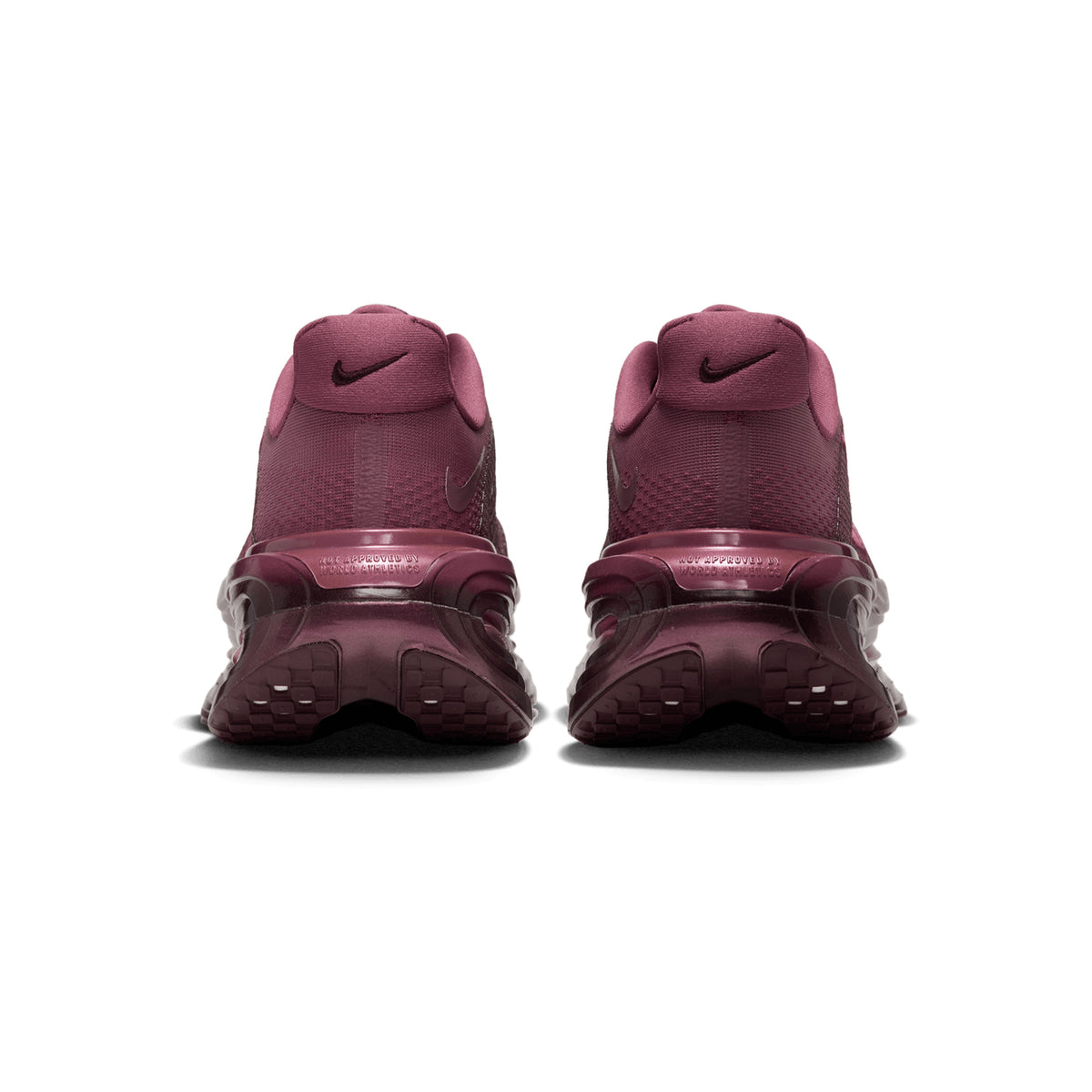 Back view of two burgundy Women’s Vomero Premium GG Running Shoes Pink Smoke / Mystic Dates, highlighting the heels and textured ZoomX cushioning soles.