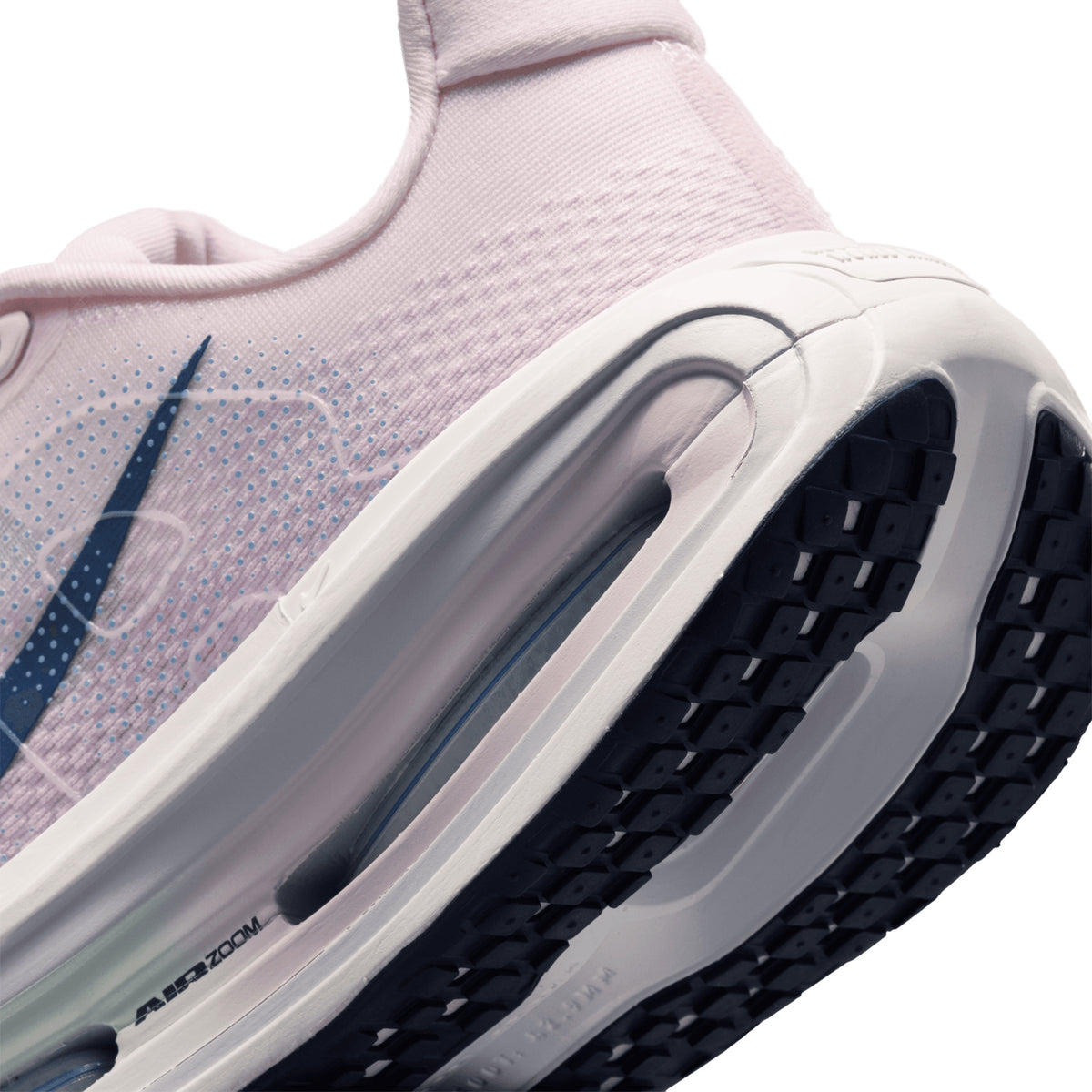 Women's Nike Vomero Premium Running Shoes Pearl Pink White angled side and heel view showing premium cushioning with dual Air Zoom and ZoomX foam platform for comfortable daily running