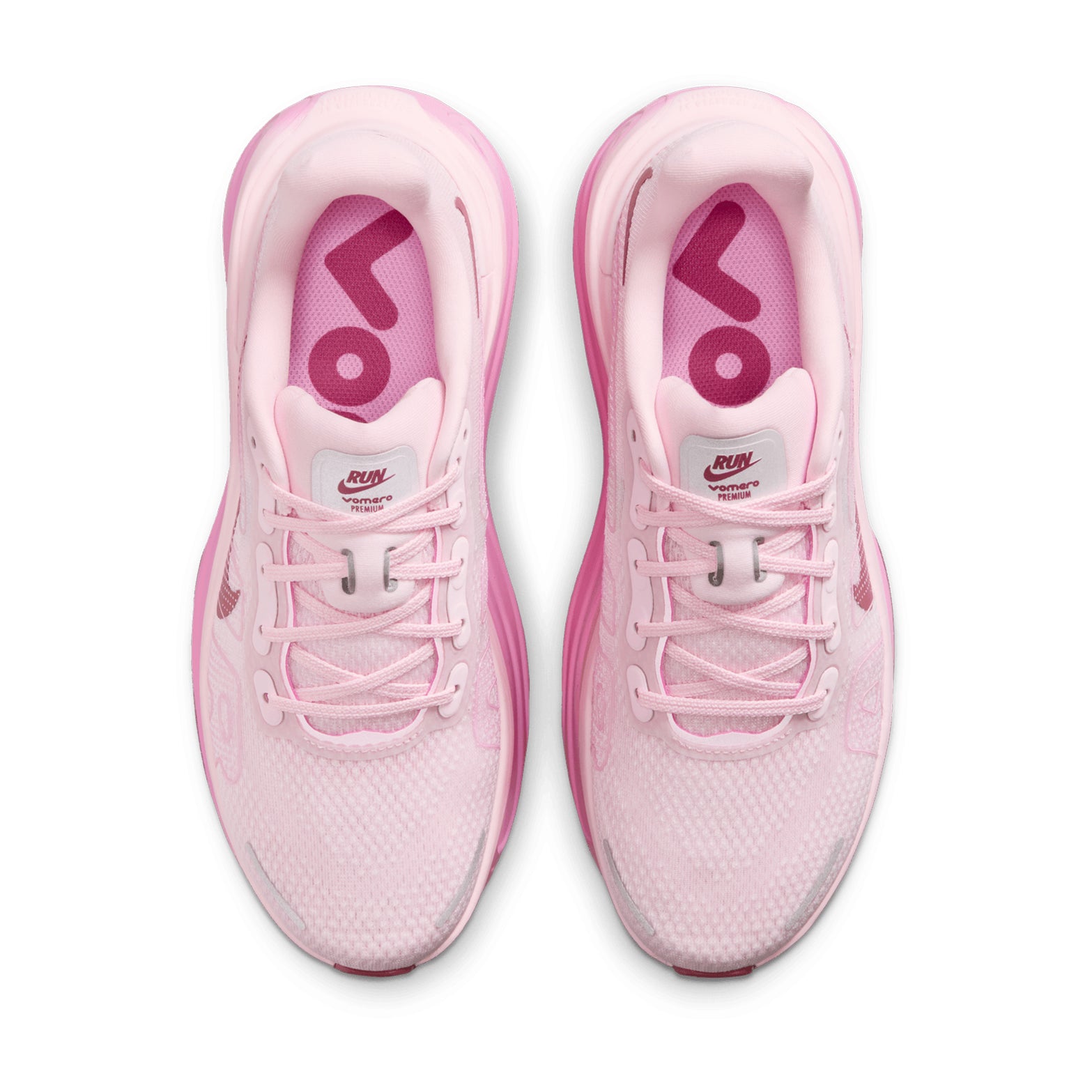 Nike Vomero Premium women's running shoe in Pink Foam / Pink Rise / Light Magenta / Pink Smoke — top-down view showing pink foam engineered mesh upper construction, lace closure and pink rise, light magenta and pink smoke accent detailing