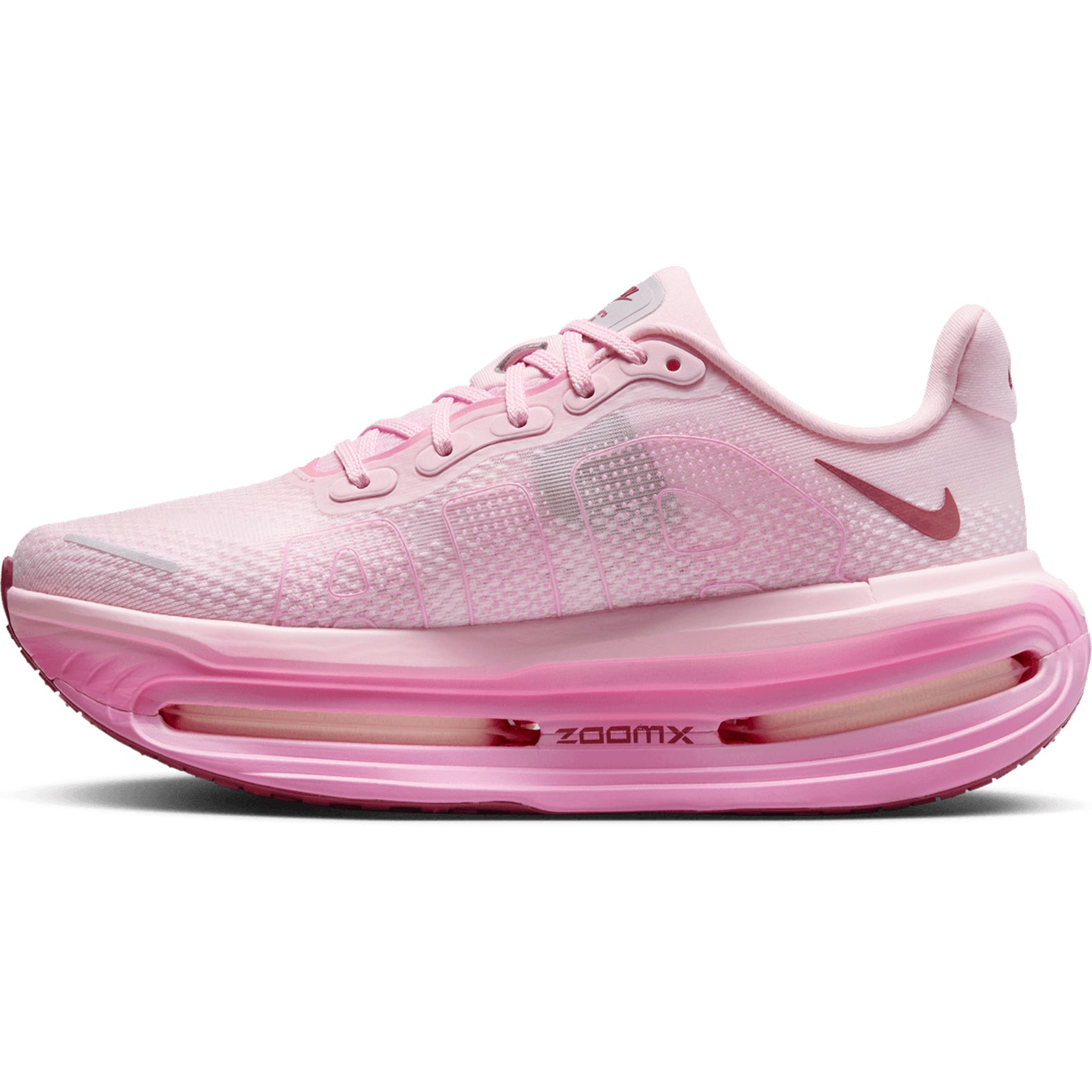 Nike Vomero Premium women's running shoe in Pink Foam / Pink Rise / Light Magenta / Pink Smoke — inner view showing pink foam engineered mesh upper, pink rise midsole detailing, responsive cushioning and foam construction with support structure