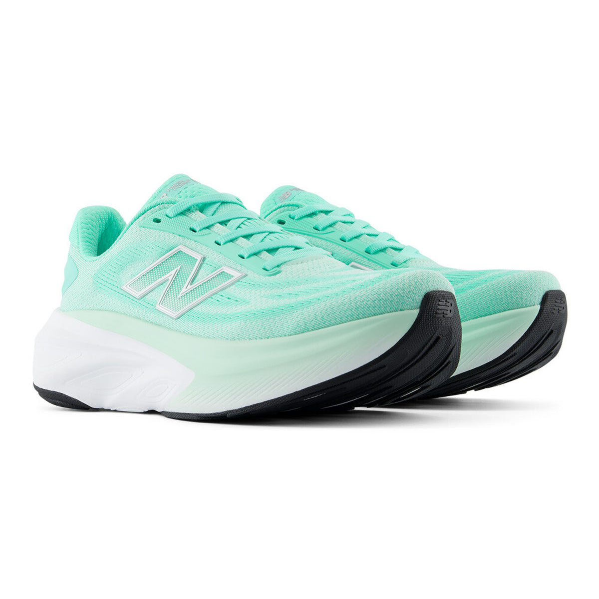 Women's New Balance Fresh Foam X More v6 Running Shoes Bright Mint Cosmic Jade angled side view of pair showing 44mm heel Fresh Foam X stack with wide base, high sidewalls and strategic rubber outsole for maximum cushioned daily running