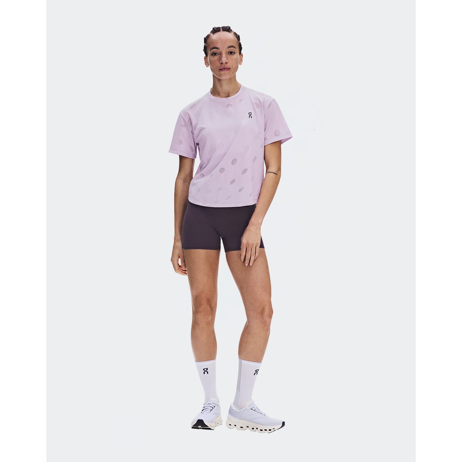 Women's On Zero-T Breathe Foxglove front full body view on female runner showing ultralight OAC-inspired jacquard tee with DryTec breathable construction for comfortable training performance