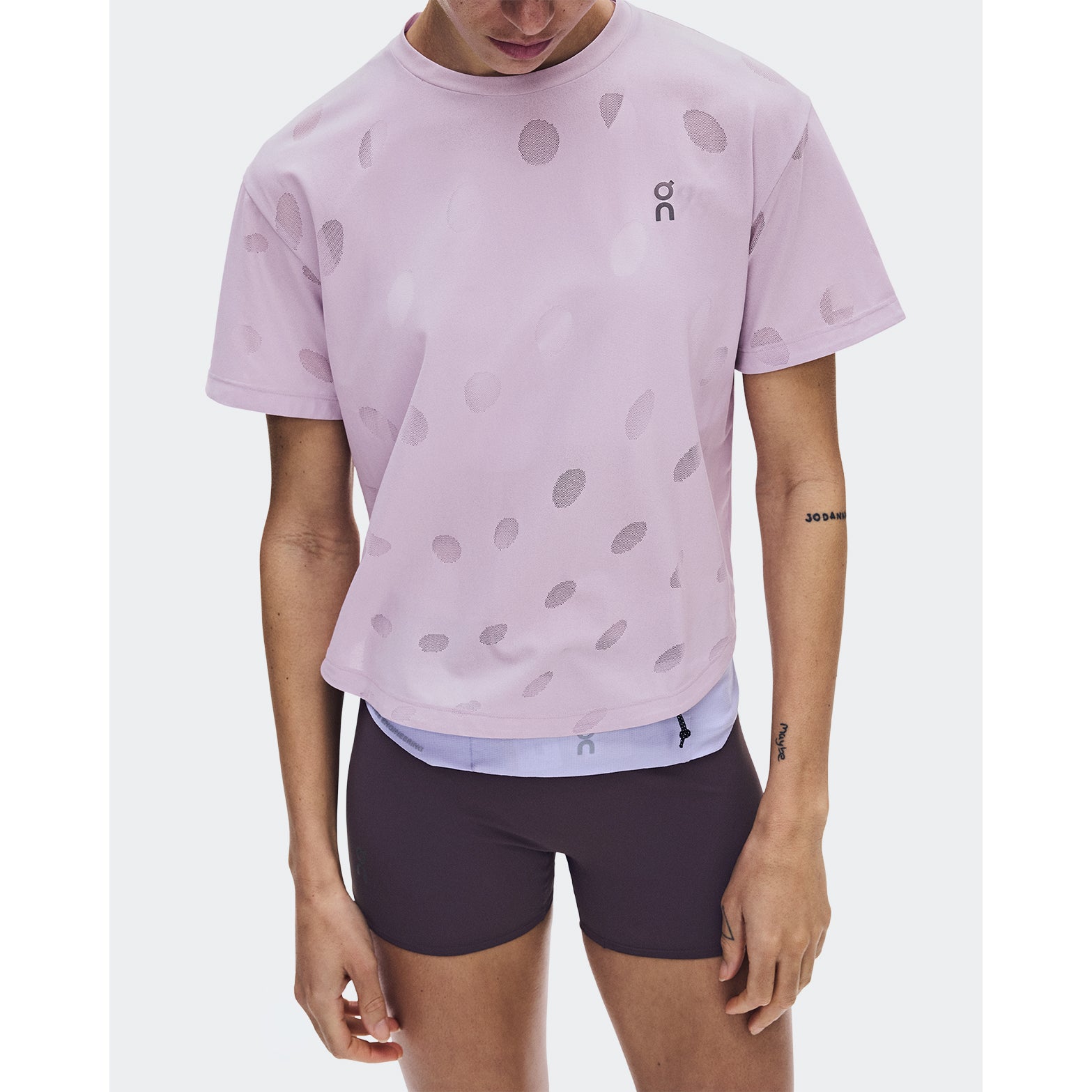 Women's On Zero-T Breathe Foxglove close-up of front on female runner showing ultralight functional jacquard construction with On DryTec breathable moisture-wicking fabric and minimalist distraction-free design for training runs