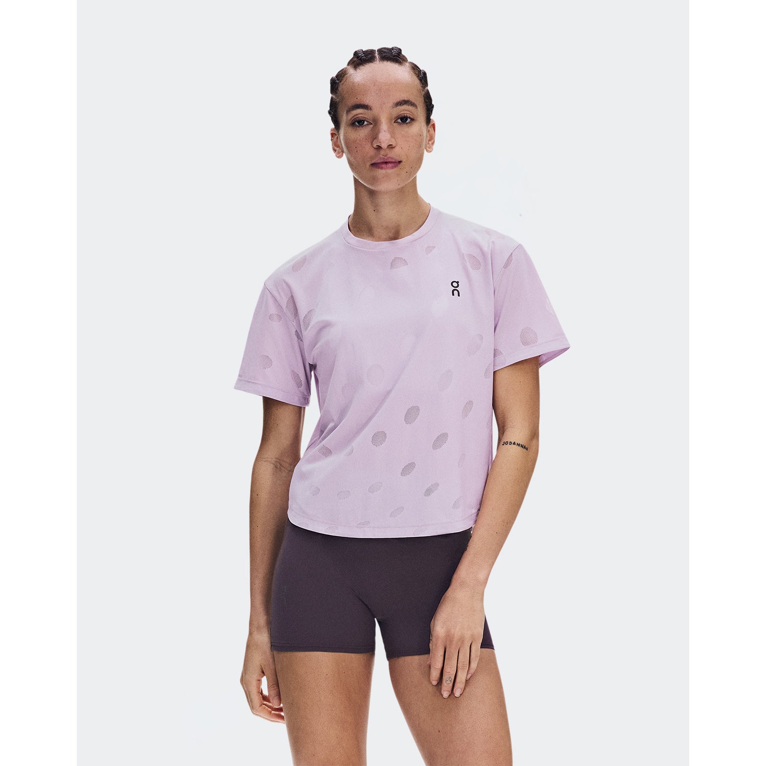 Women's On Zero-T Breathe Foxglove front view on female runner showing ultralight DryTec breathable jacquard construction with distraction-free fit for training runs