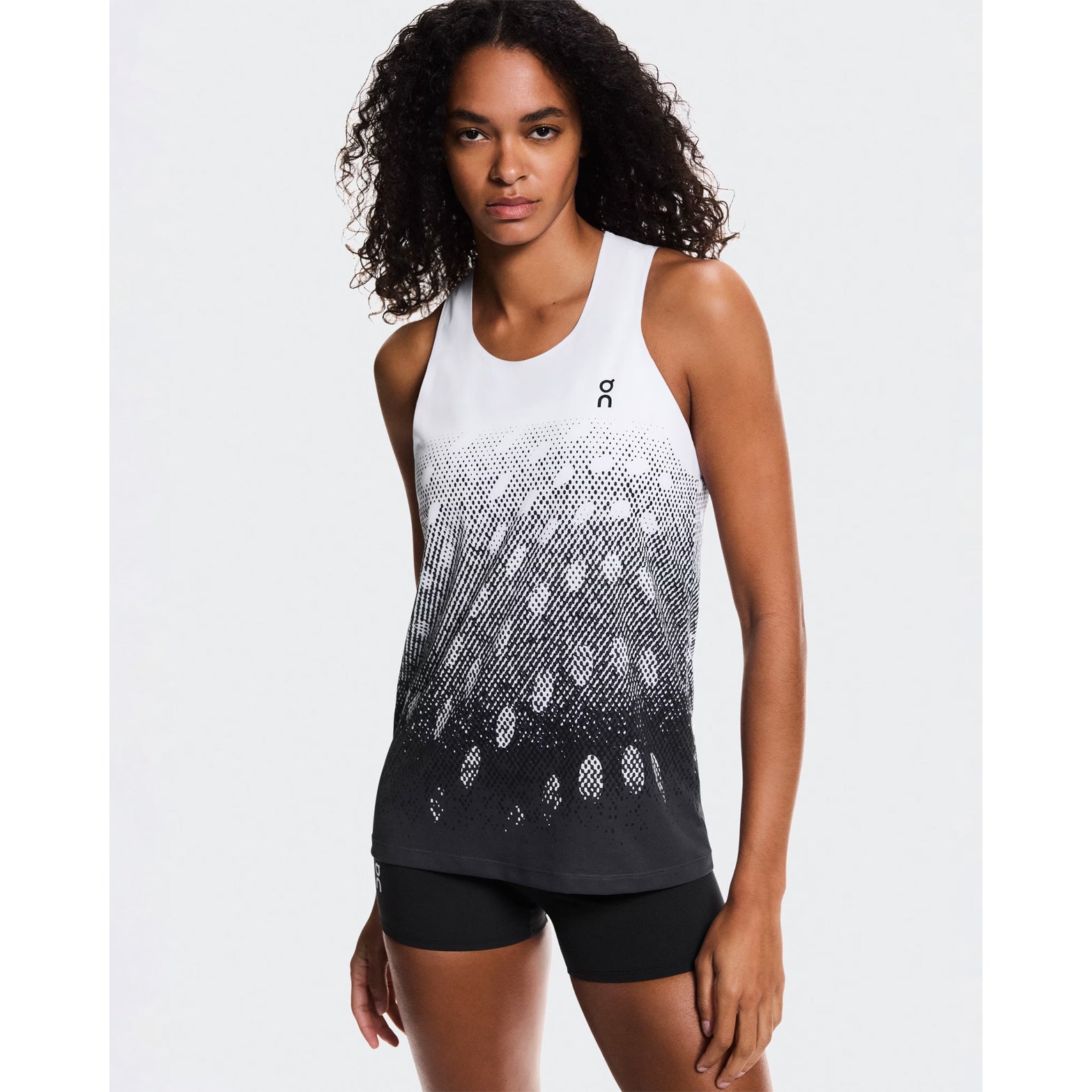 Women's On Zero Singlet White Black Grey front view on female runner showing expressive graphic inspired by On athlete prints and race-ready fit
