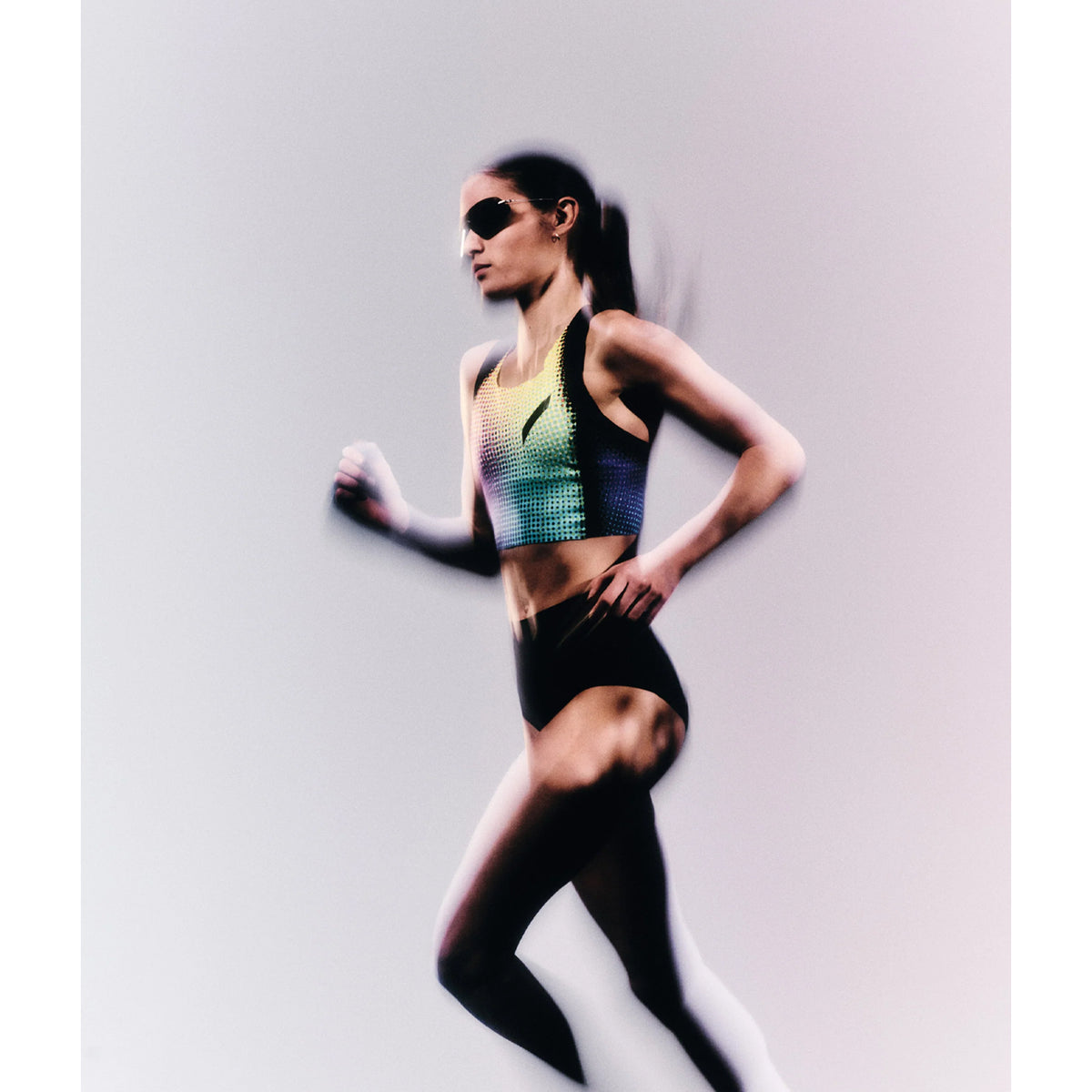 Soar x Cubitts Cirrus 02 Sunglasses in Silver — worn on female model showing ultralight titanium frame fit, silver colourway and custom ZEISS RiPel™ lens in studio setting