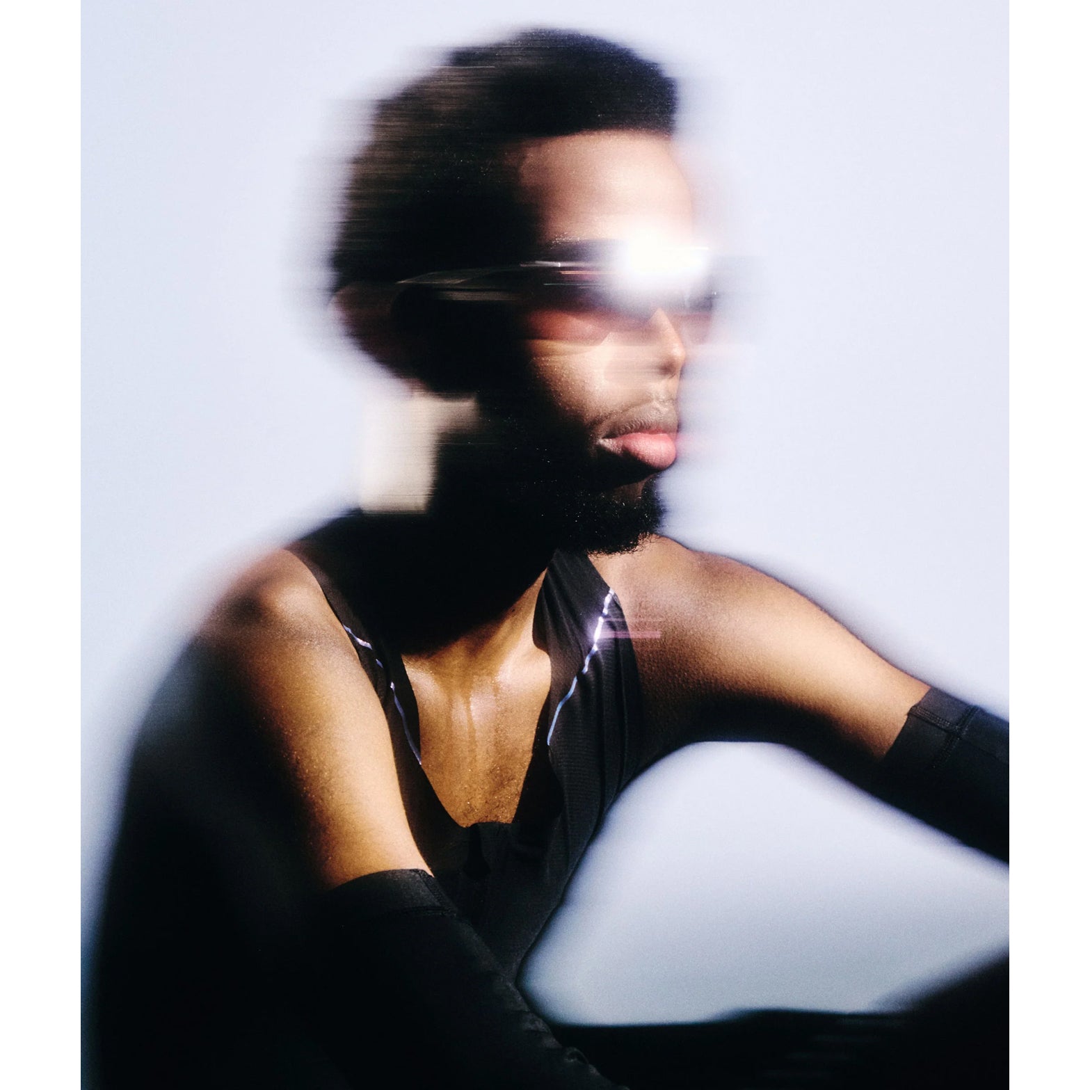 Soar x Cubitts Cirrus 02 Sunglasses in Silver — worn on male model showing ultralight titanium frame fit, silver colourway and custom ZEISS RiPel™ lens in studio light