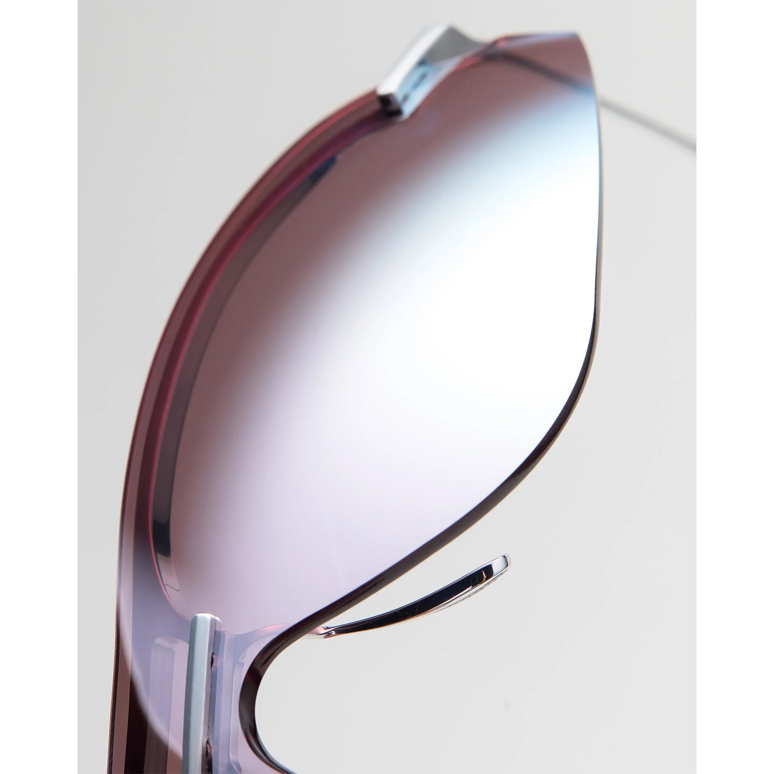Soar x Cubitts Cirrus 02 Sunglasses in Silver — angled closeup showing titanium frame construction, ZEISS RiPel™ lens profile and silver colourway detail
